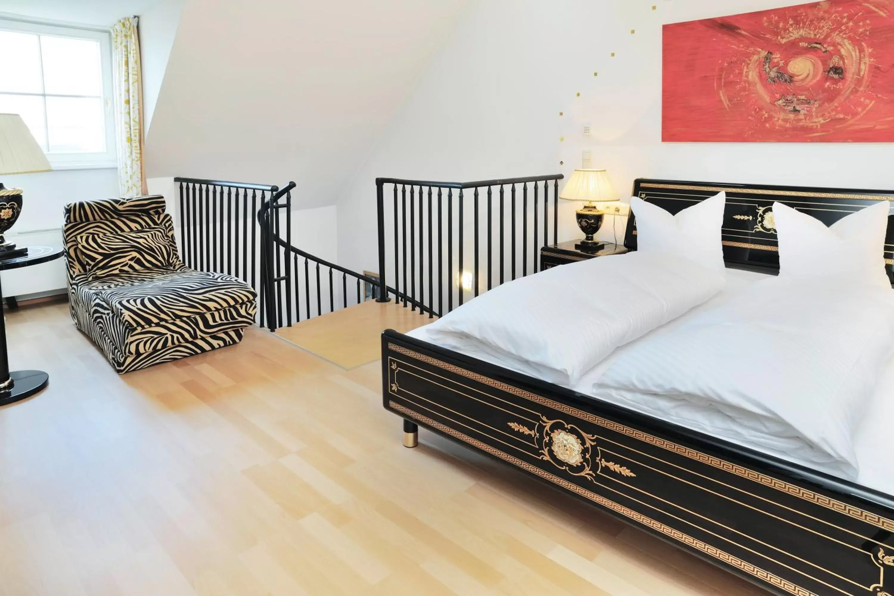 Bed in Hotel Schwarzer Adler Innsbruck
