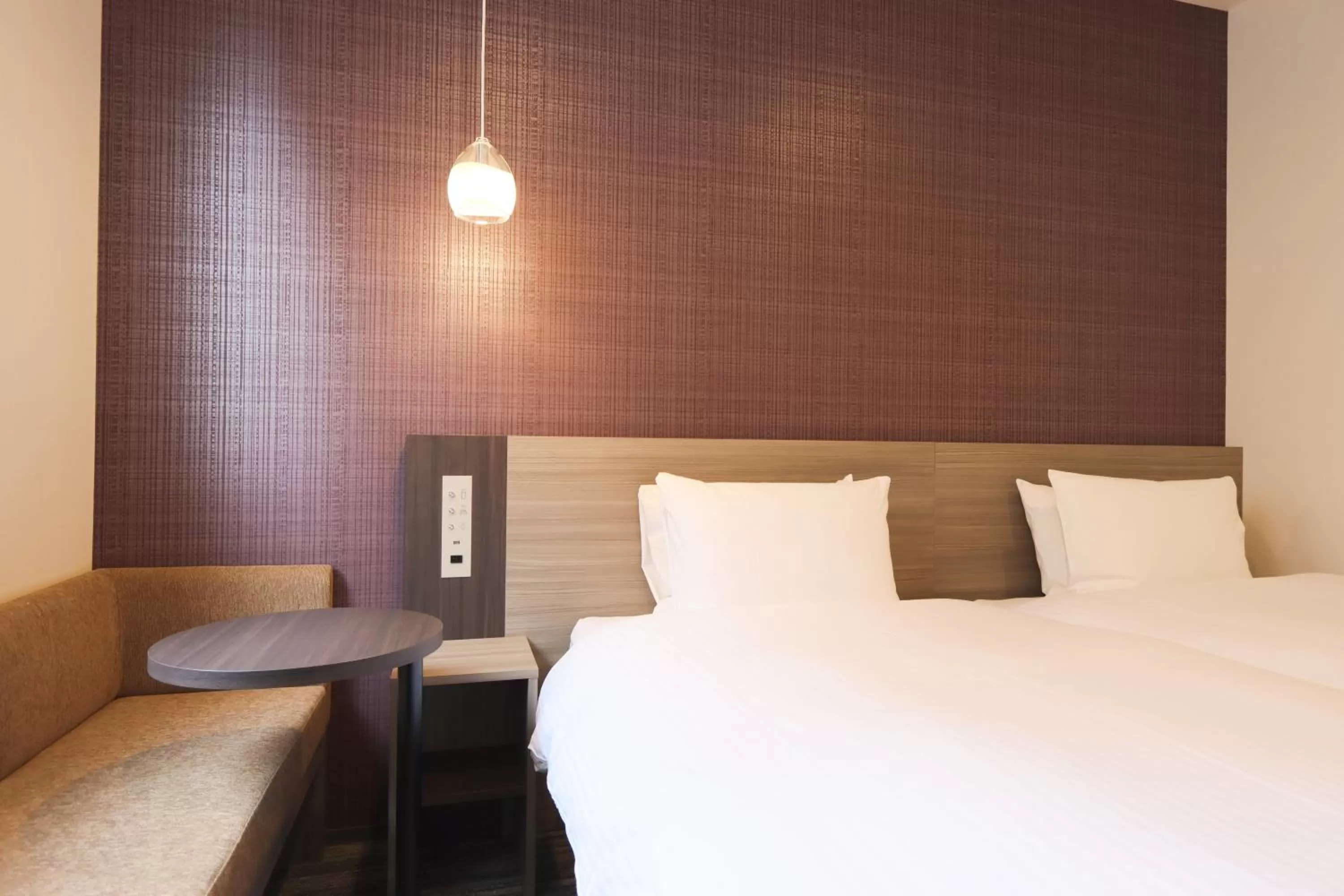 Bed in Wander Kyoto Nanajo