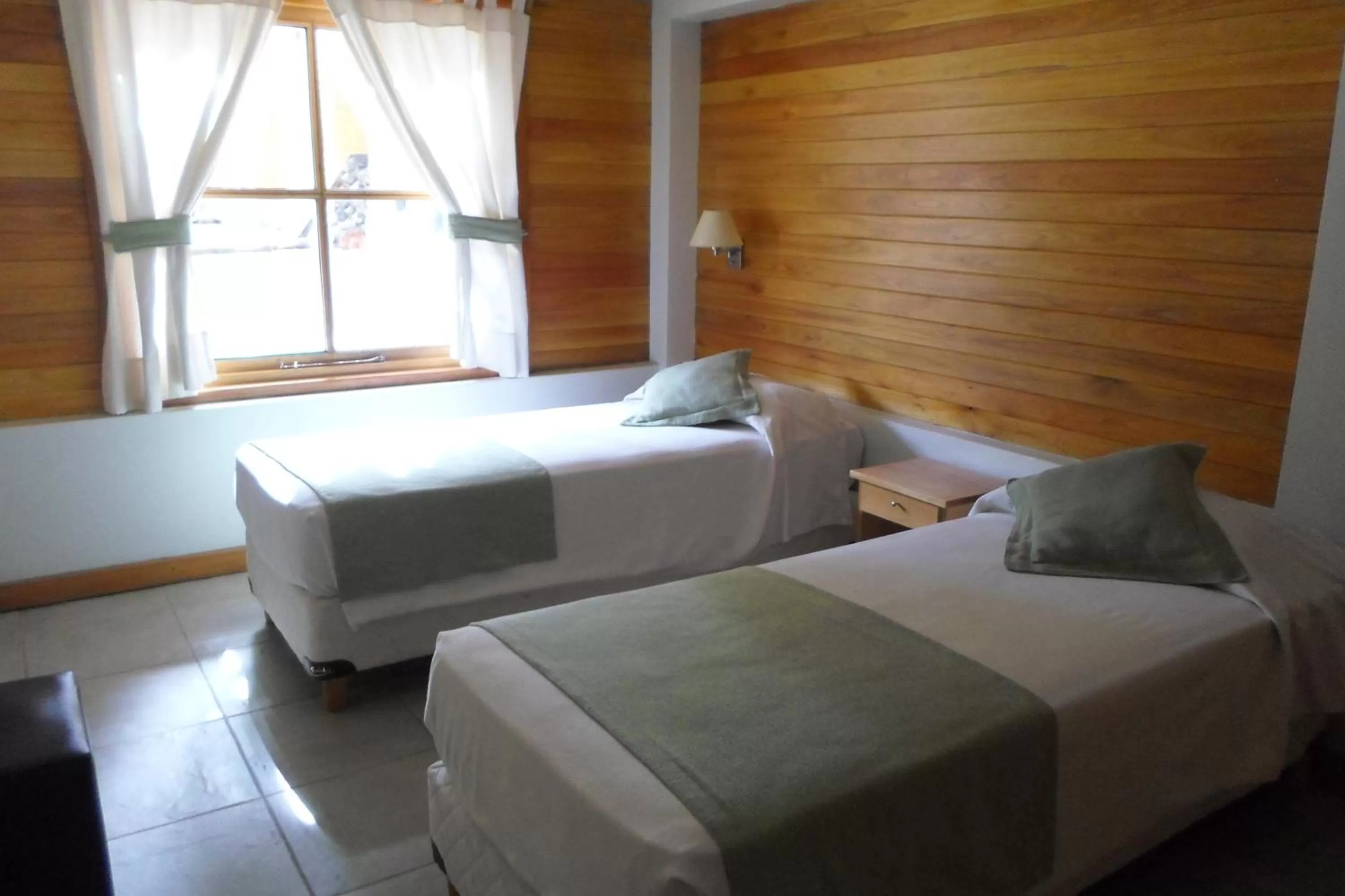 Bed in Apart Hotel Robles del Sur
