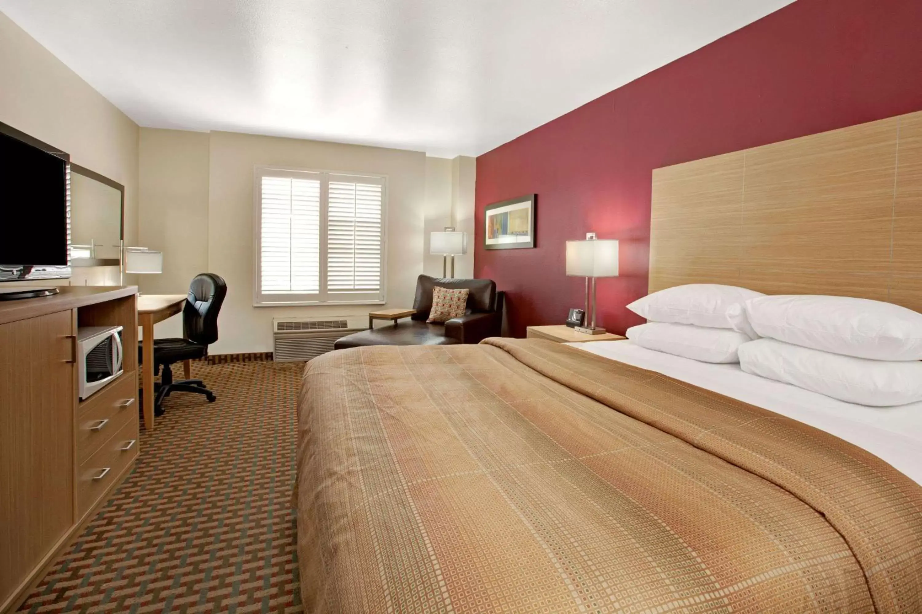 Photo of the whole room, Bed in Ramada Limited and Suites San Francisco Airport