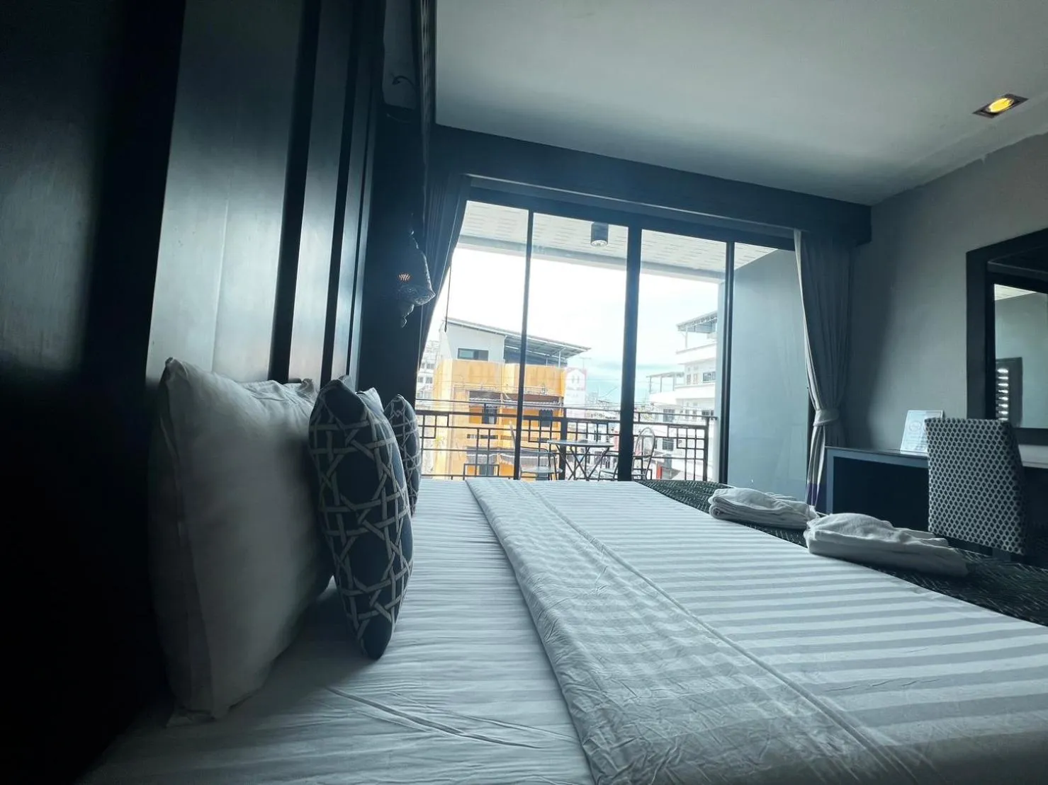 Bed in Srisawara Casa Hotel