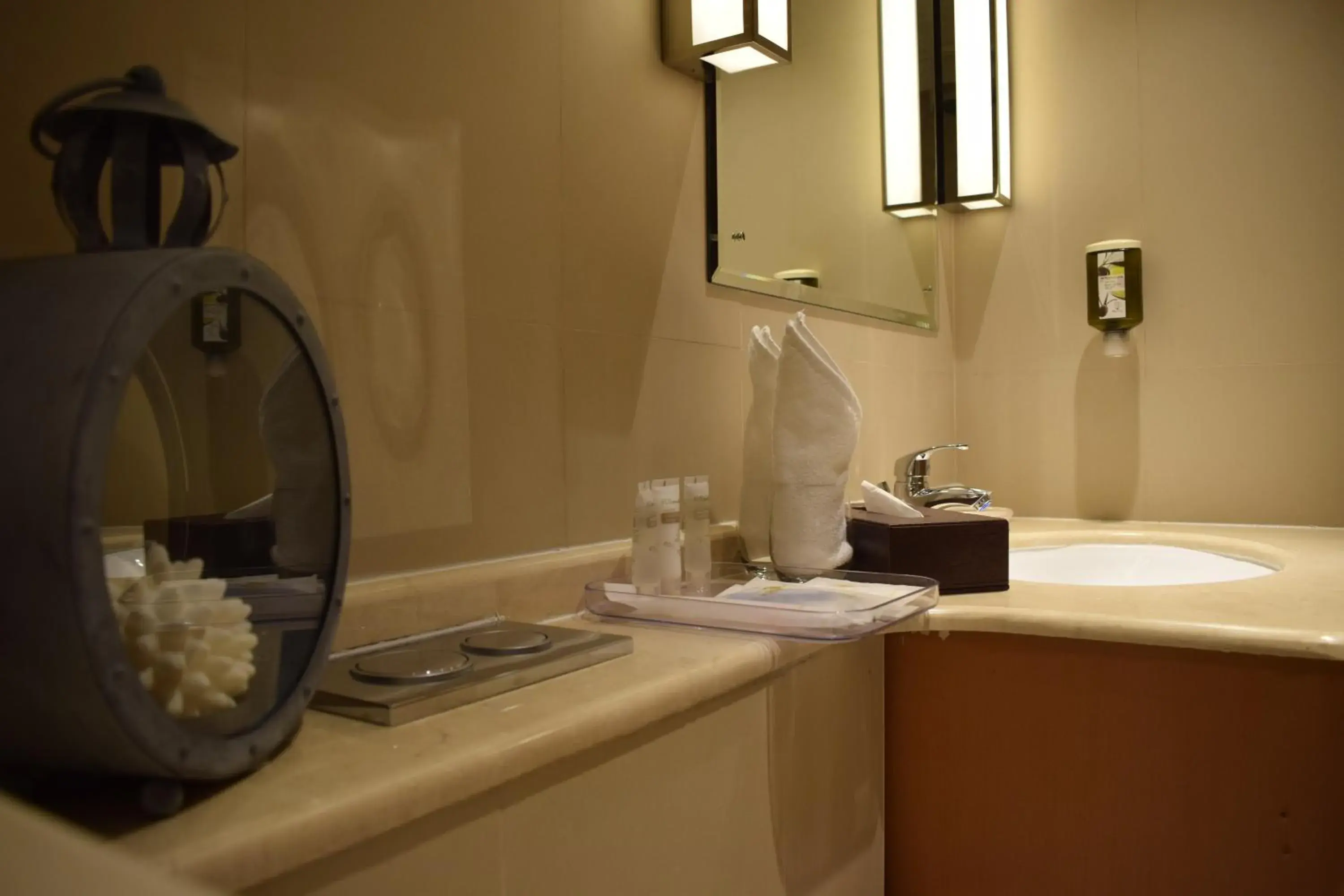 Bathroom in Levatio Suites Muscat, a member of Radisson Individuals