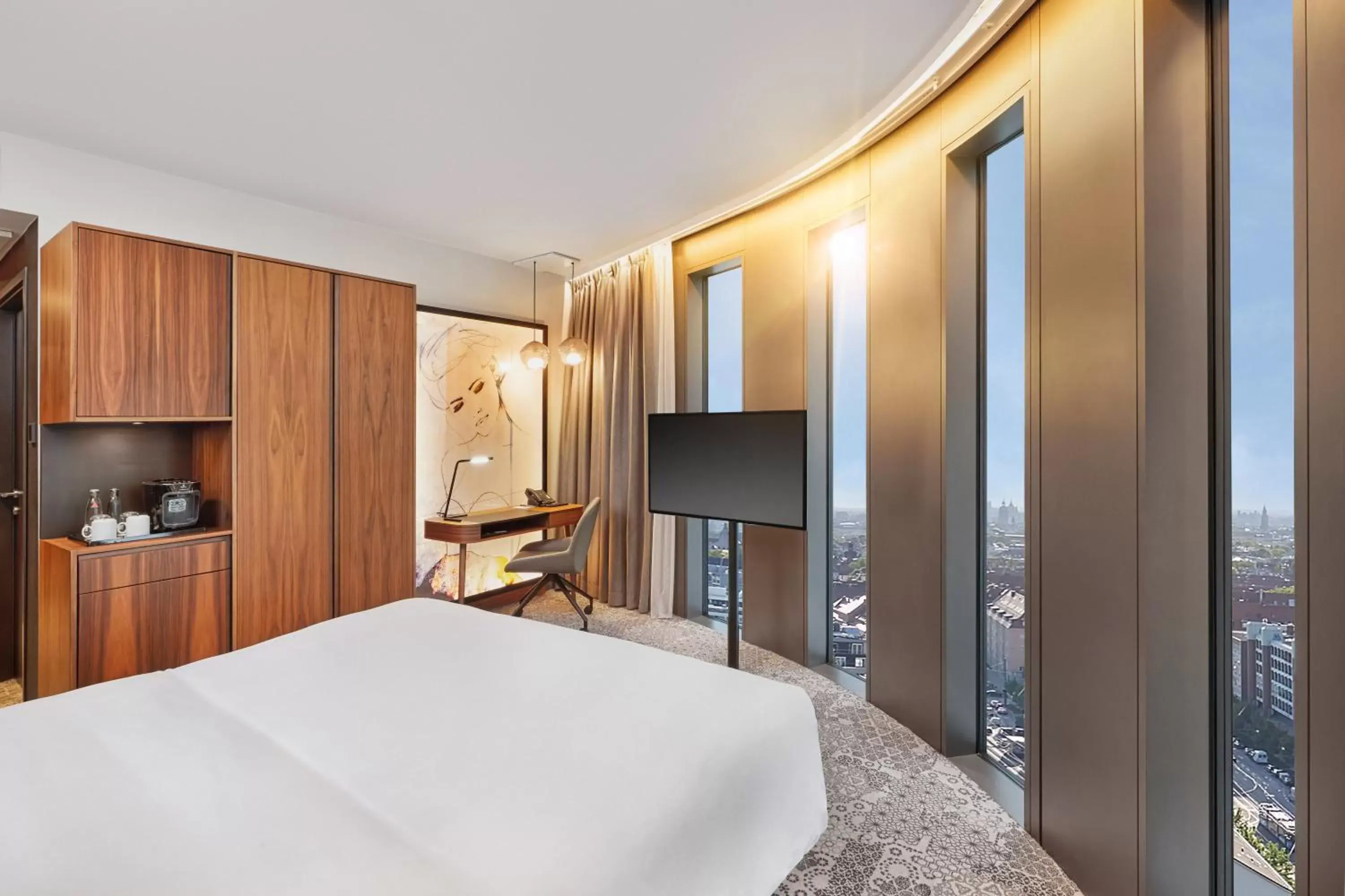 TV and multimedia, Bed in HYPERION Hotel München TV and multimedia, Bed in HYPERION Hotel München