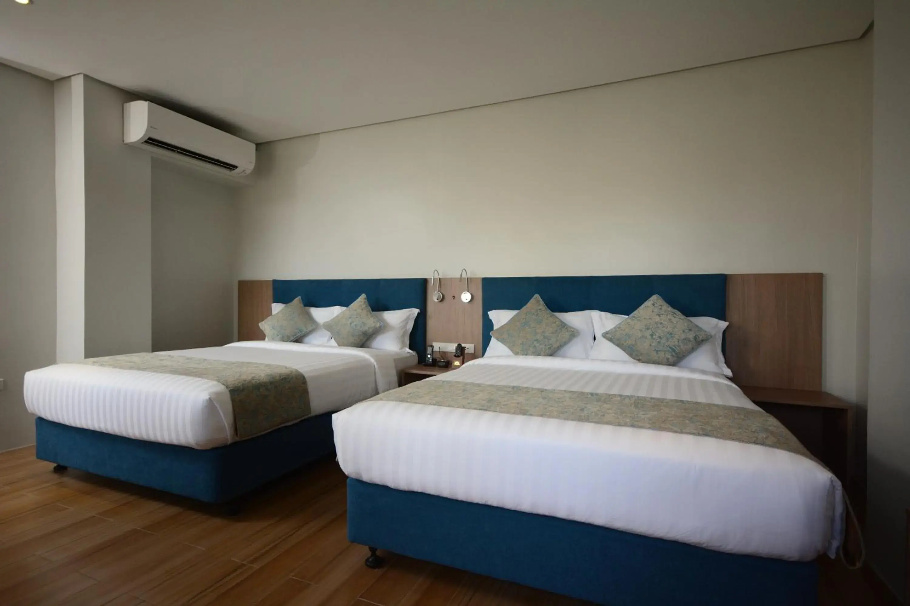 Bed in Blue Lotus Hotel