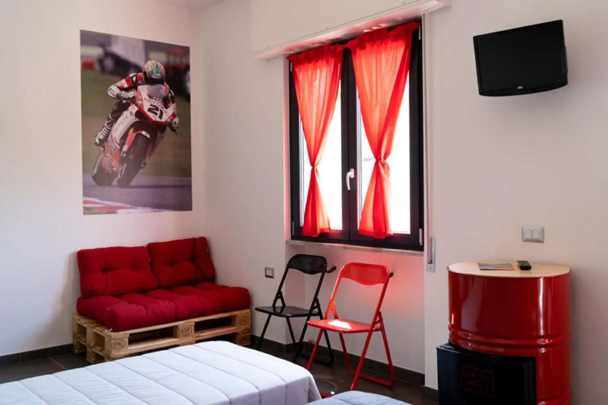 Bedroom, Seating Area in Italian Piston House Sport Moto Rent