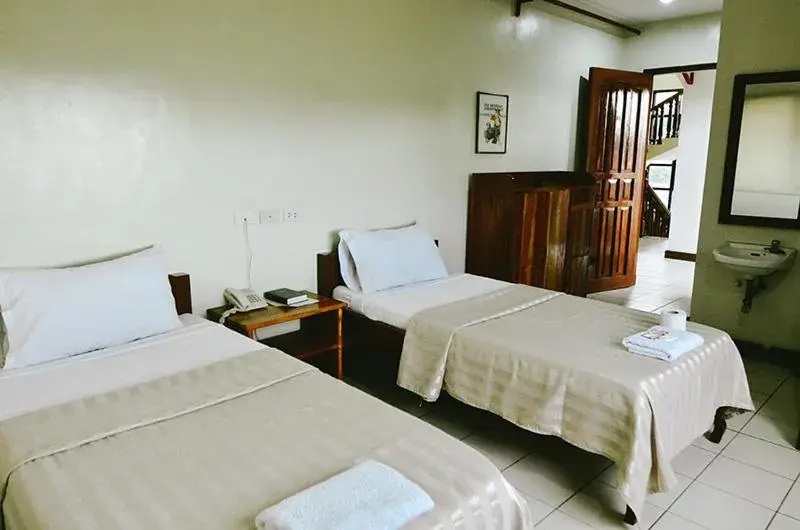 Bed in El Haciendero Private Hotel