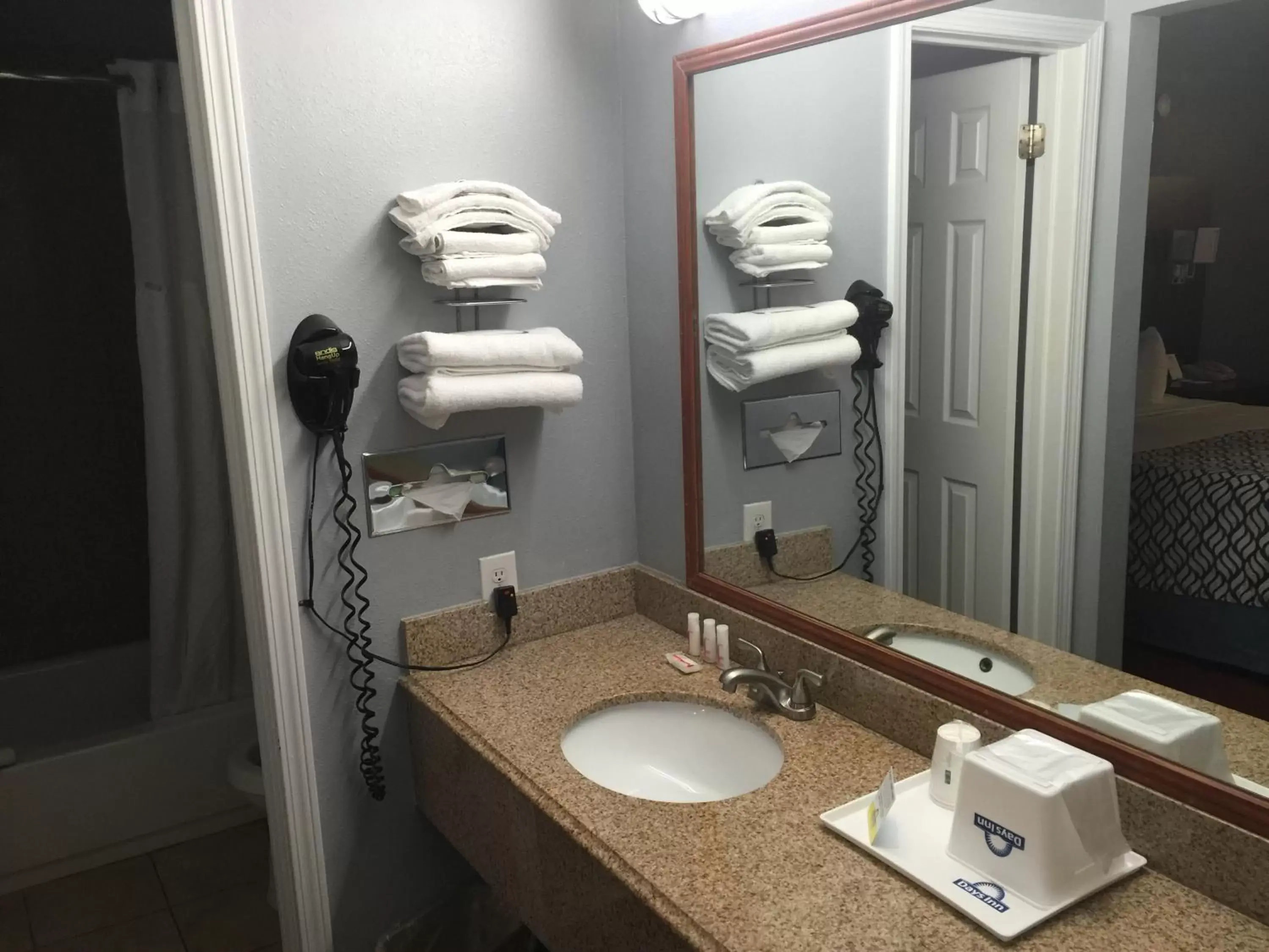 Bathroom in Days Inn by Wyndham Austin/University/Downtown