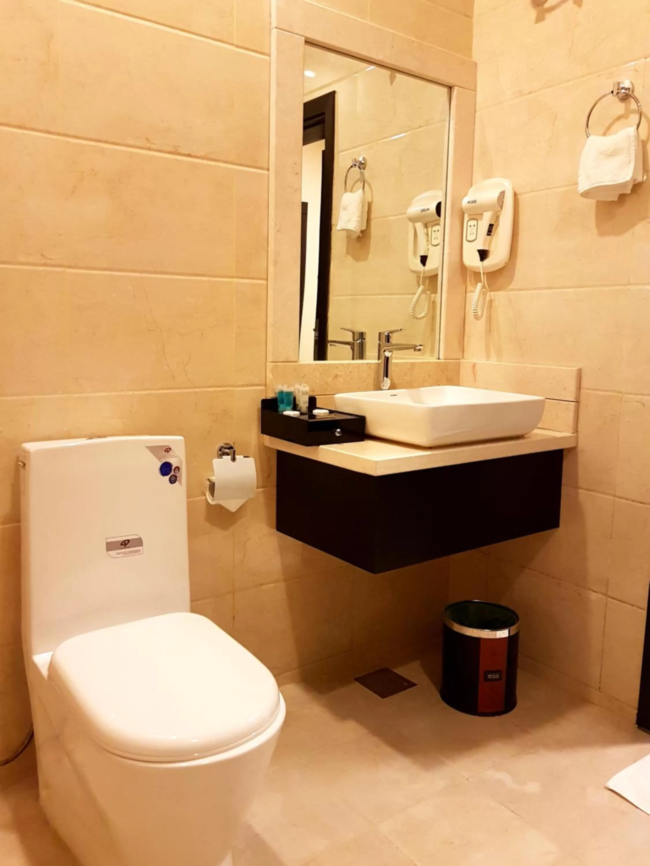 Toilet in Tanuf Residency Hotel