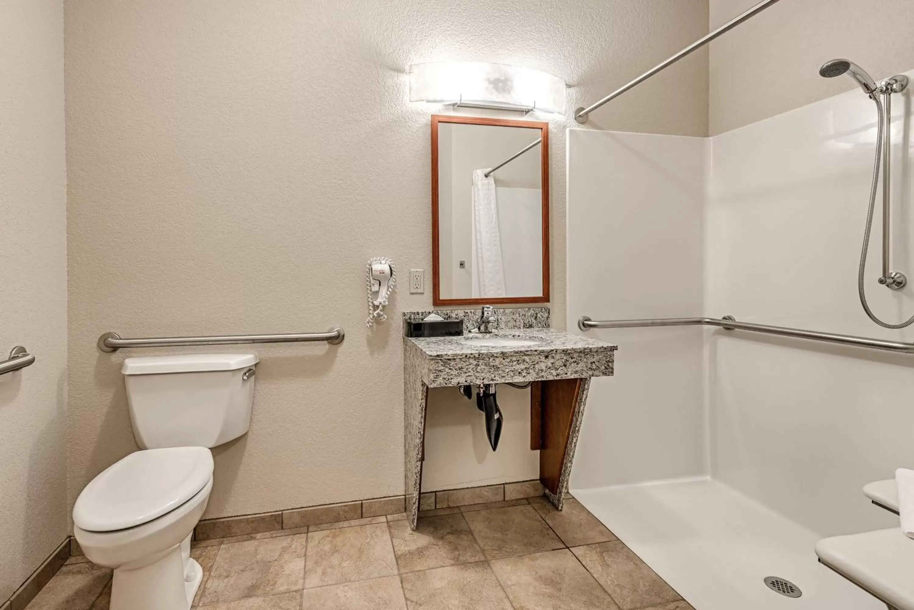 Photo of the whole room, Bathroom in Candlewood Suites Burlington, an IHG Hotel