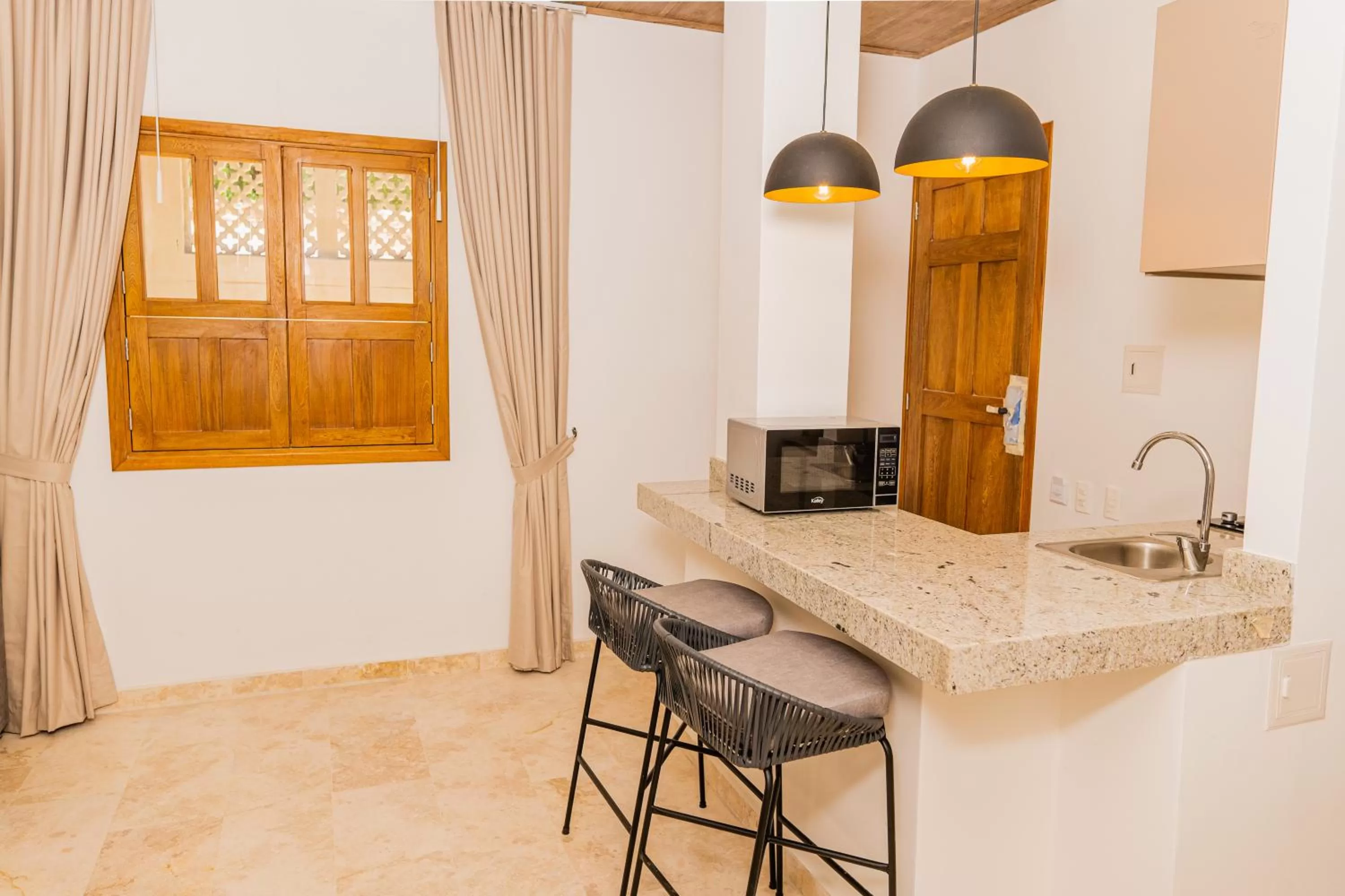 Kitchen or kitchenette in Del Mar Guest House