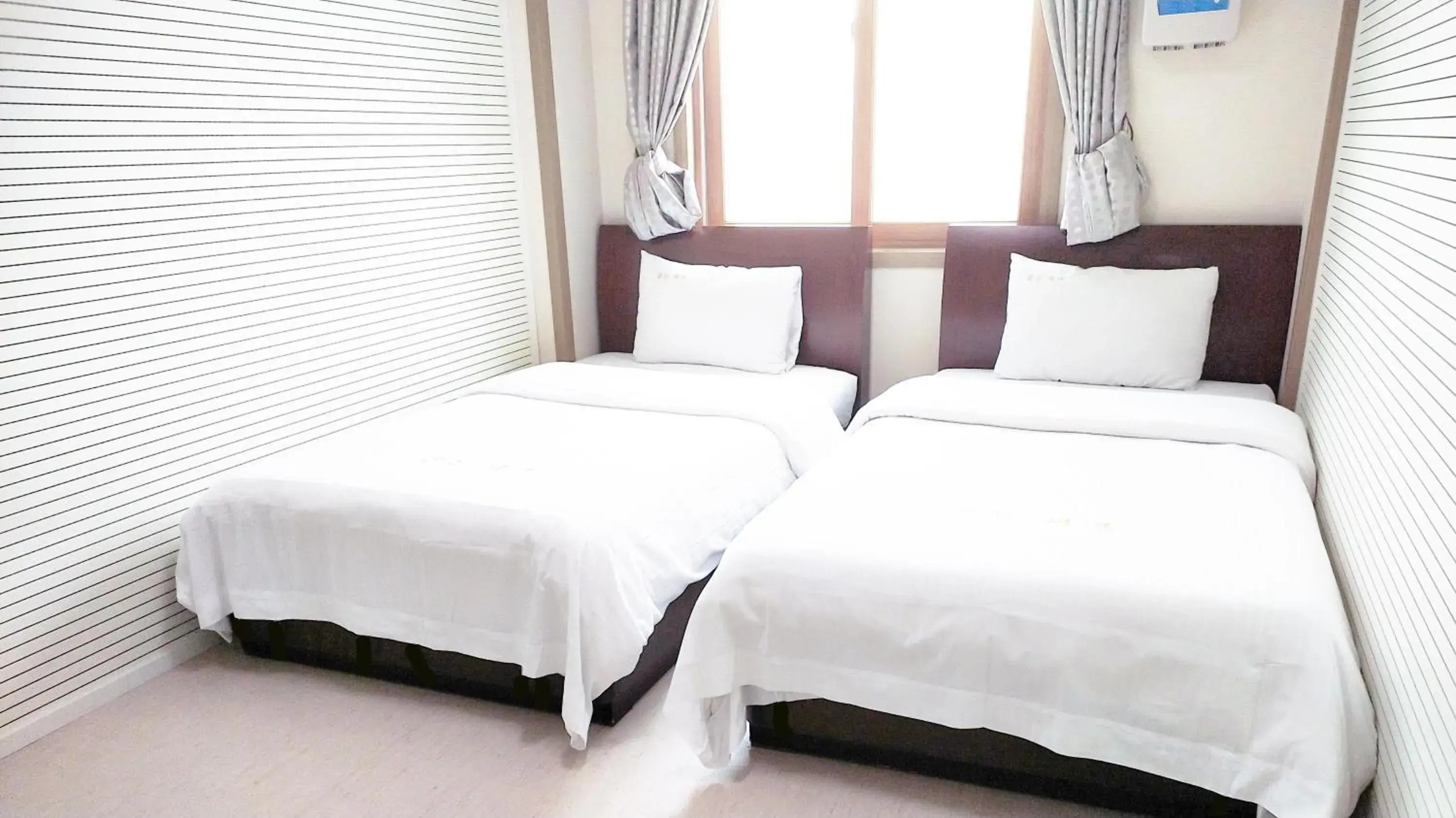 Bed in Golden Park Hotel Jeju