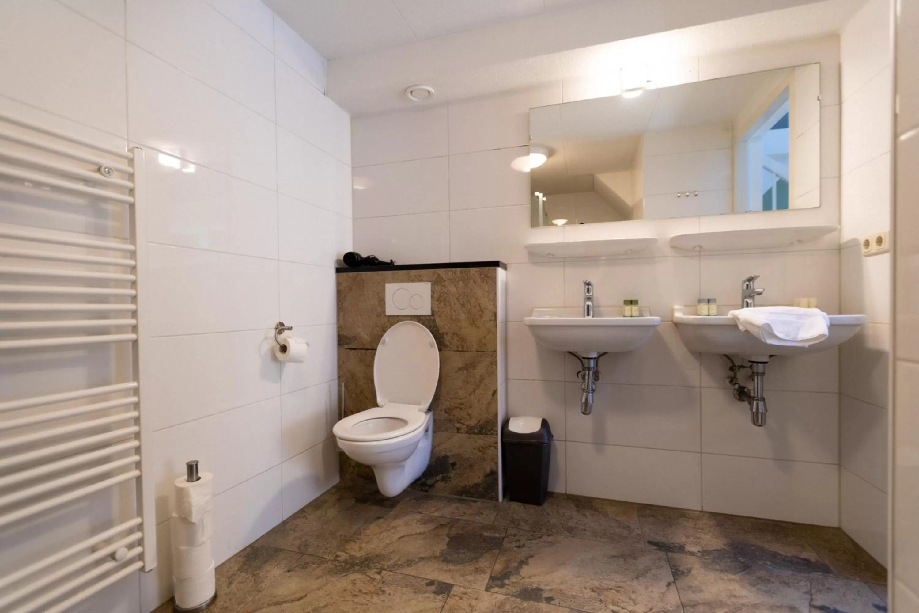 Toilet in Plantage Garden Apartments