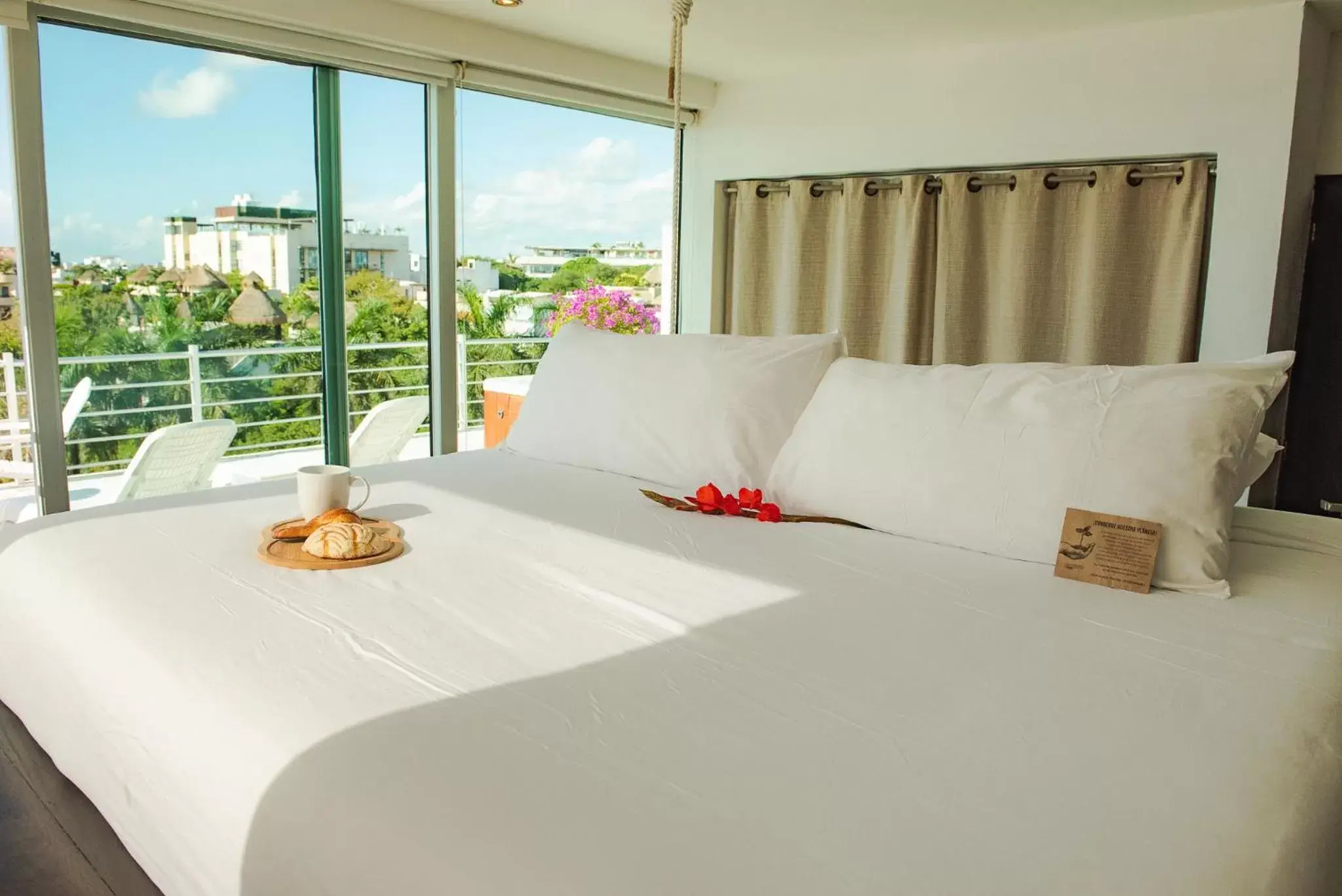 Bed in Magia Beachside Condo