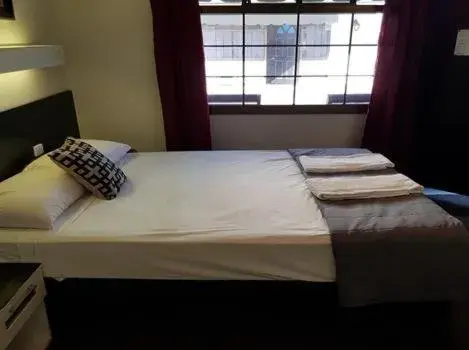 Bed in Motel Lodge