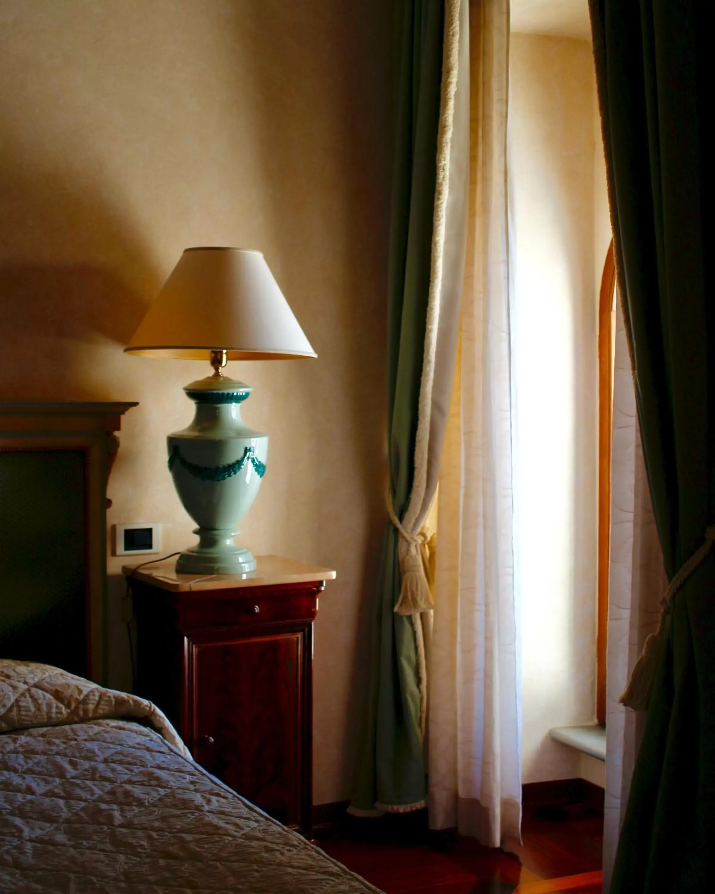 Bed, Seating Area in Relais Ducale