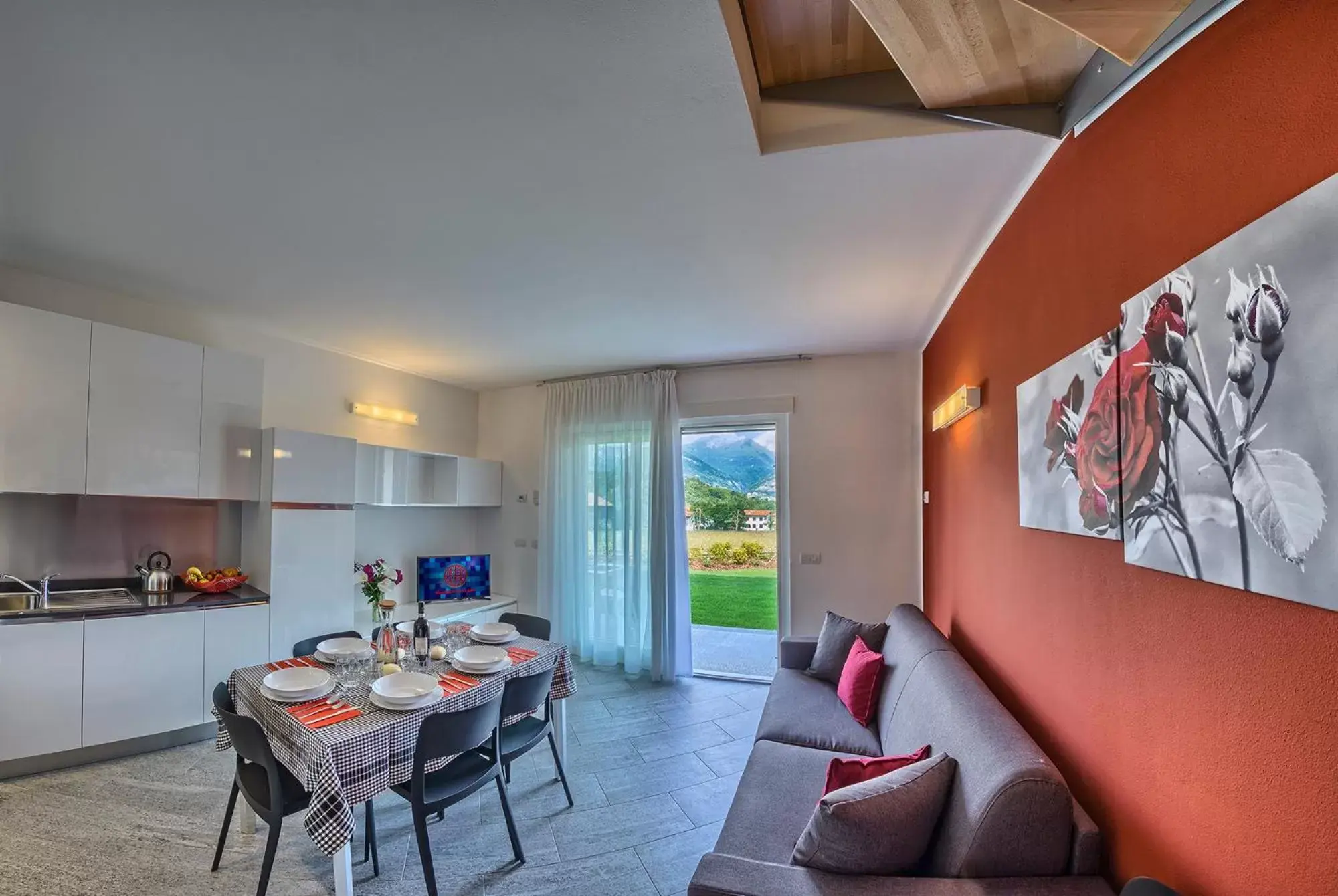 Living room, Dining Area in Rainbow Holiday Apartments Lake Como