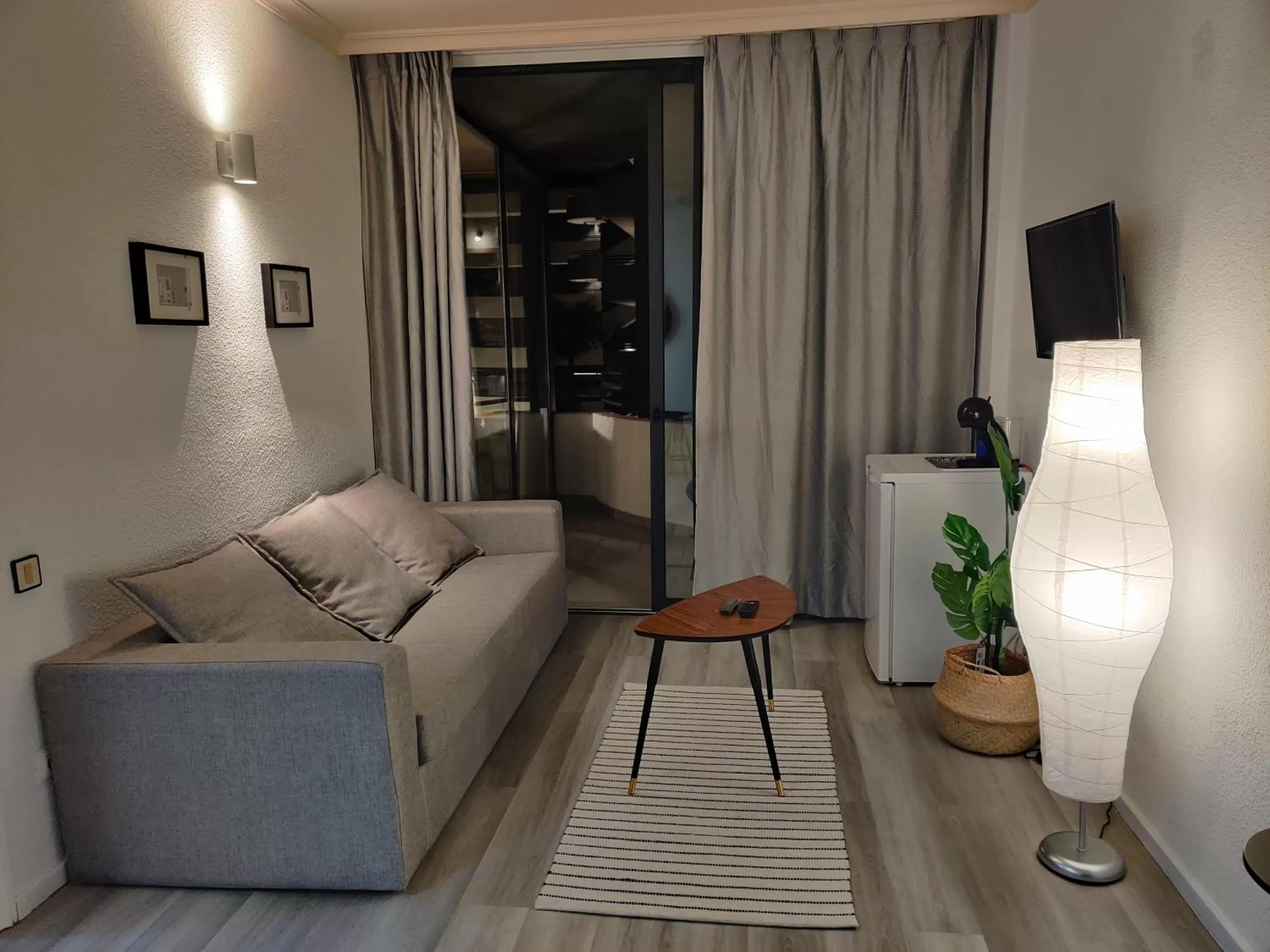 TV and multimedia in Luxury Apartment with pool view