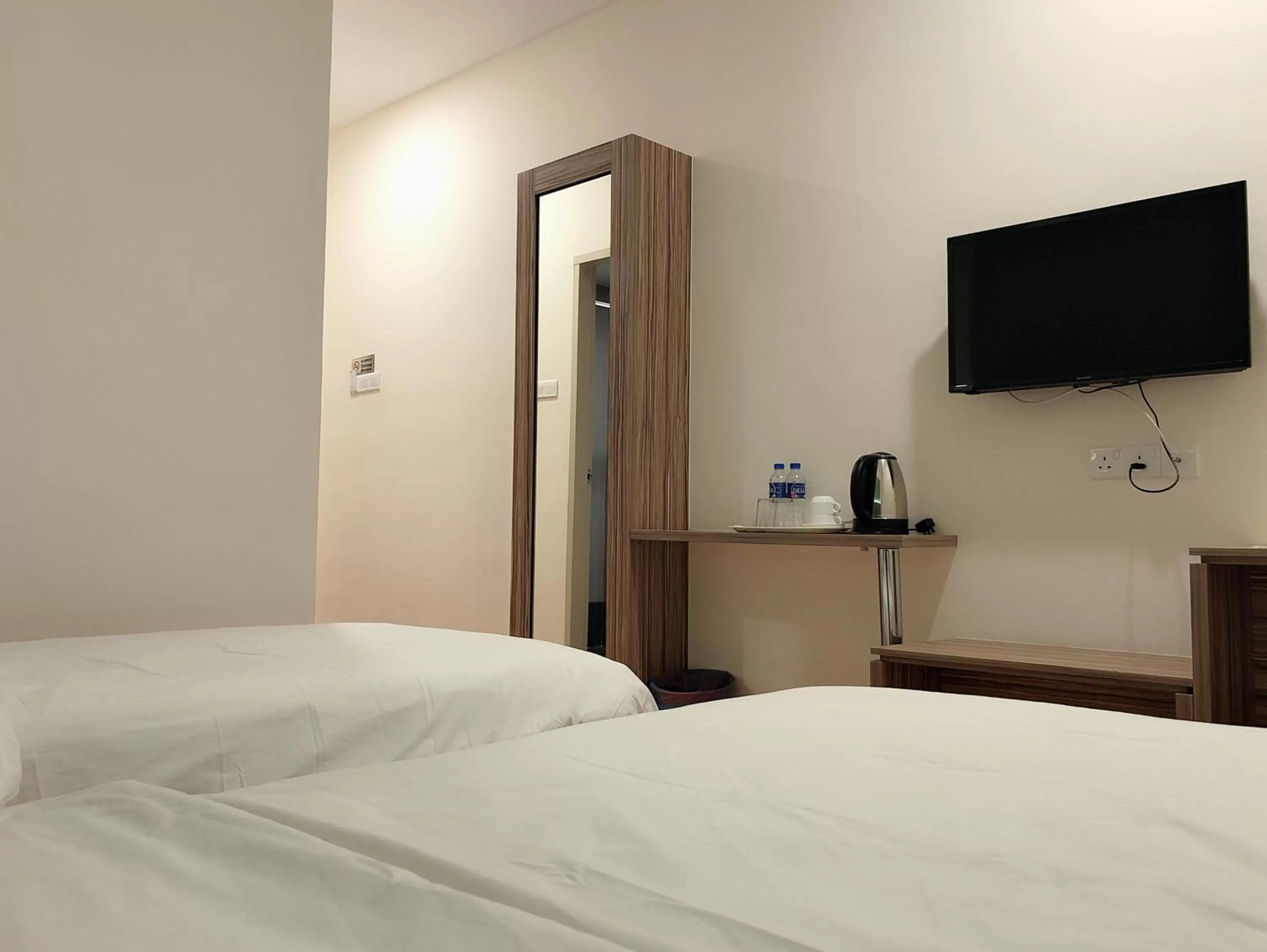 Bed in Tumike Hotel Bentong