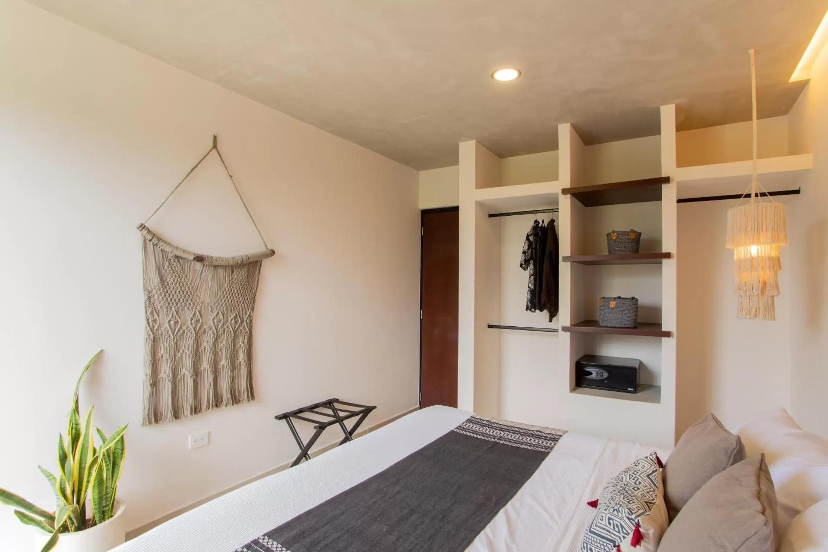 Photo of the whole room, Bed in Luxury Condos Macondo Tulum