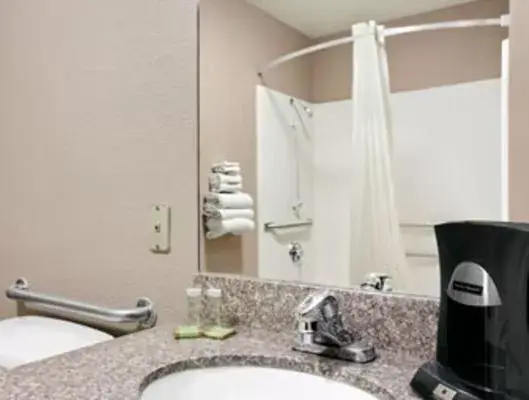 Bathroom in Super 8 by Wyndham Stafford/Springfield Area