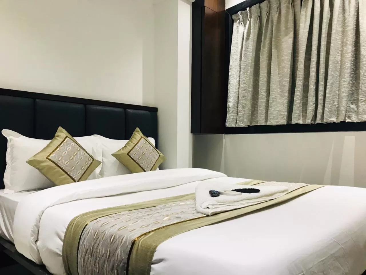 Bed in Hotel Flora Suites - Fort