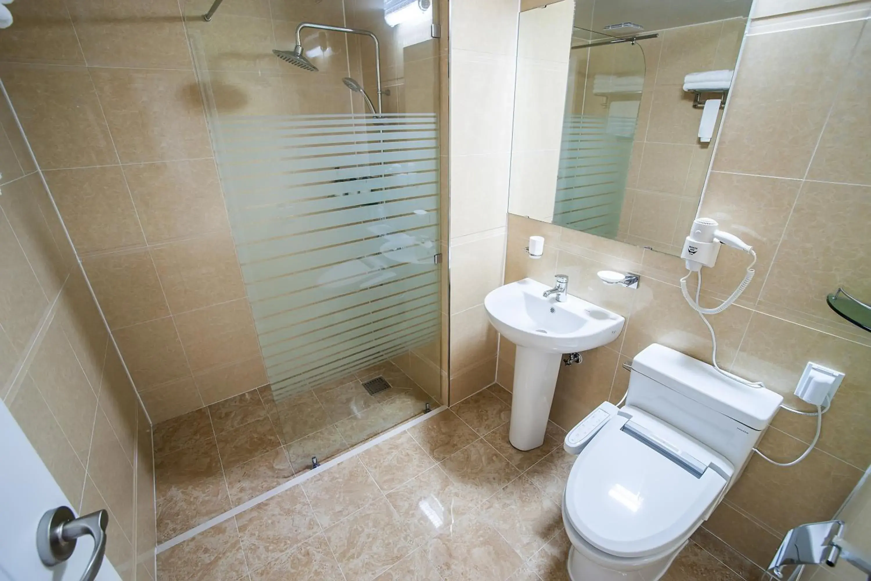 Toilet, Bathroom in Breeze Bay Hotel