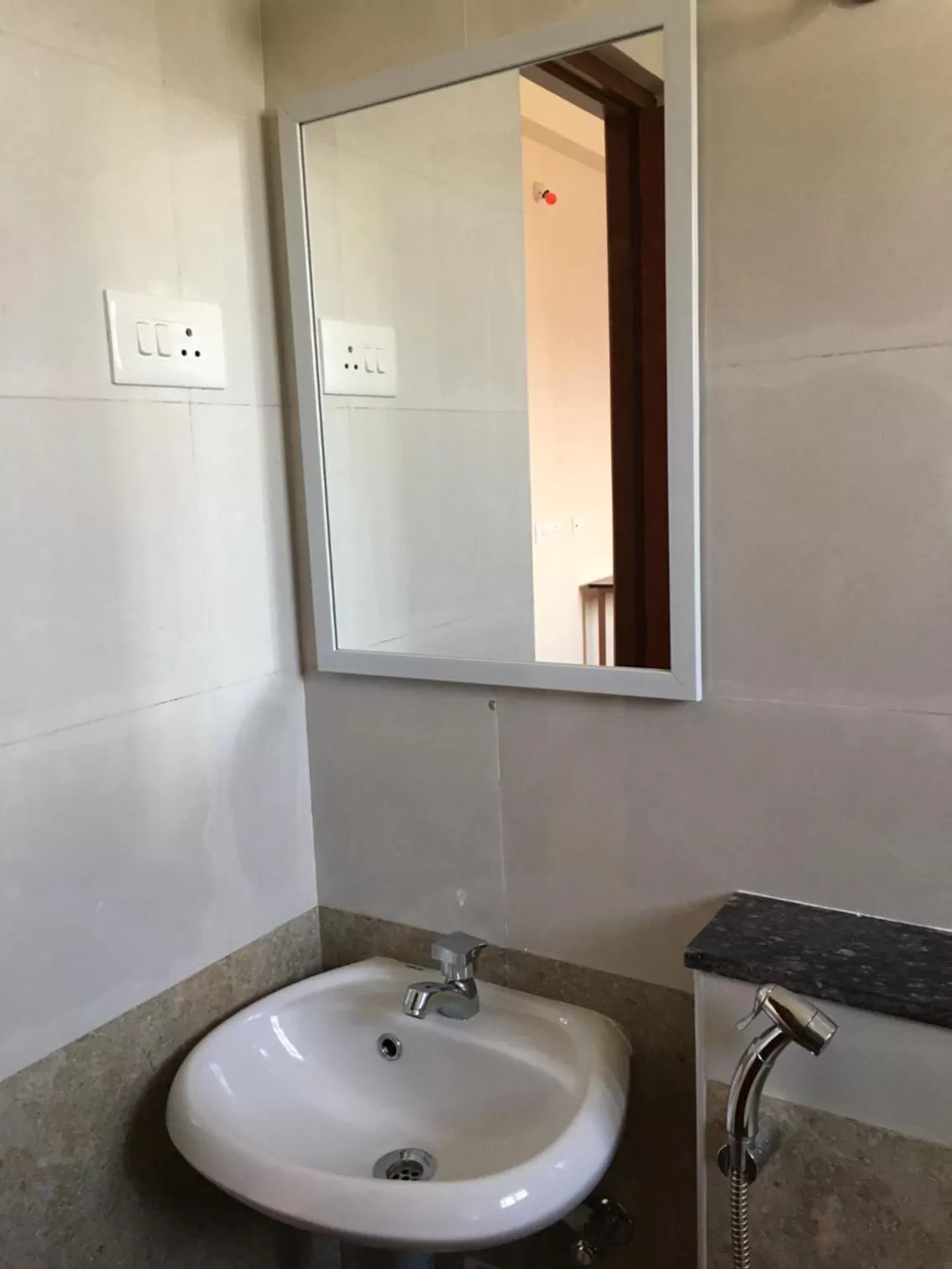 Bathroom in Shantham Service Apartments
