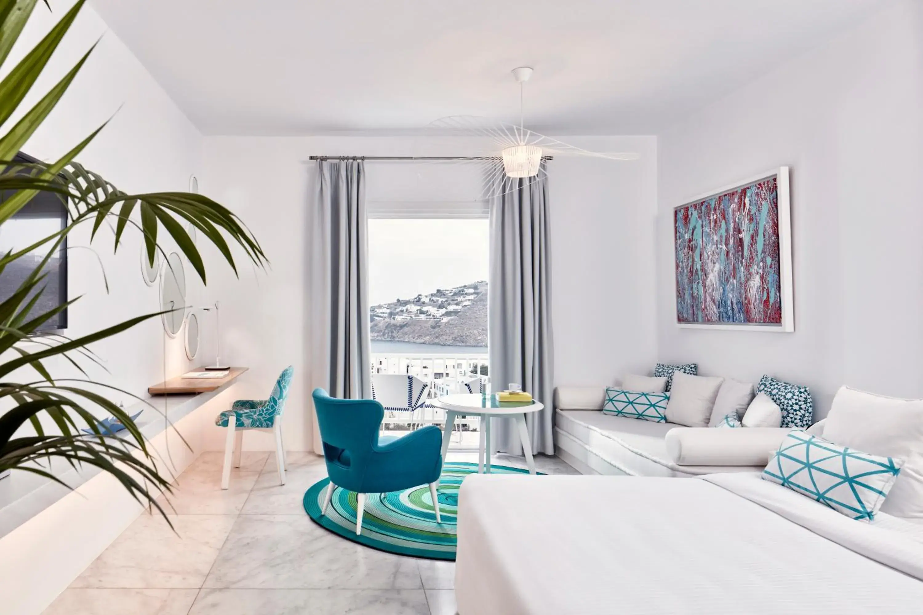 Bedroom in Myconian Ambassador Relais & Chateaux Bedroom in Myconian Ambassador Relais & Chateaux