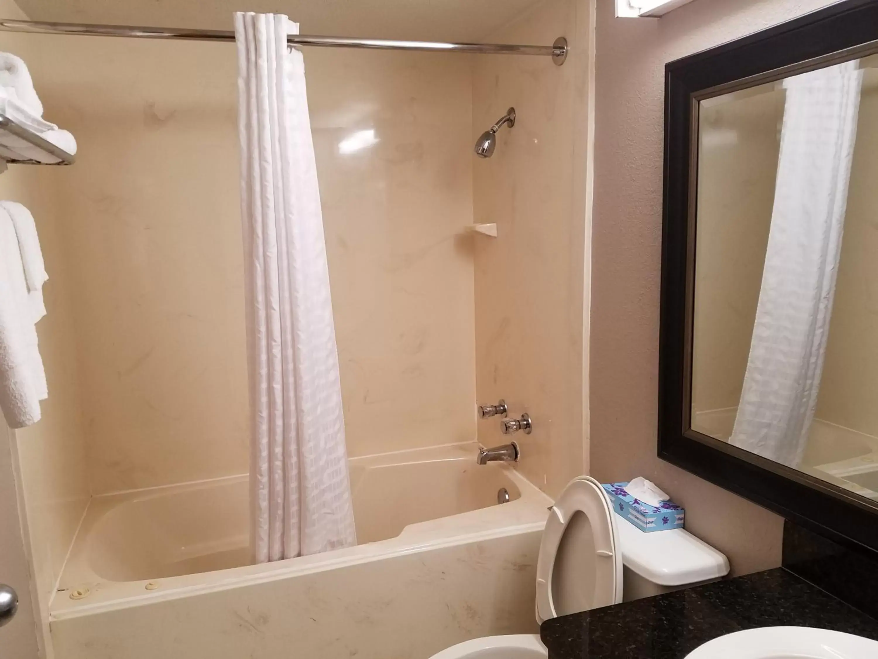 Bathroom in Super 8 by Wyndham Bentonville