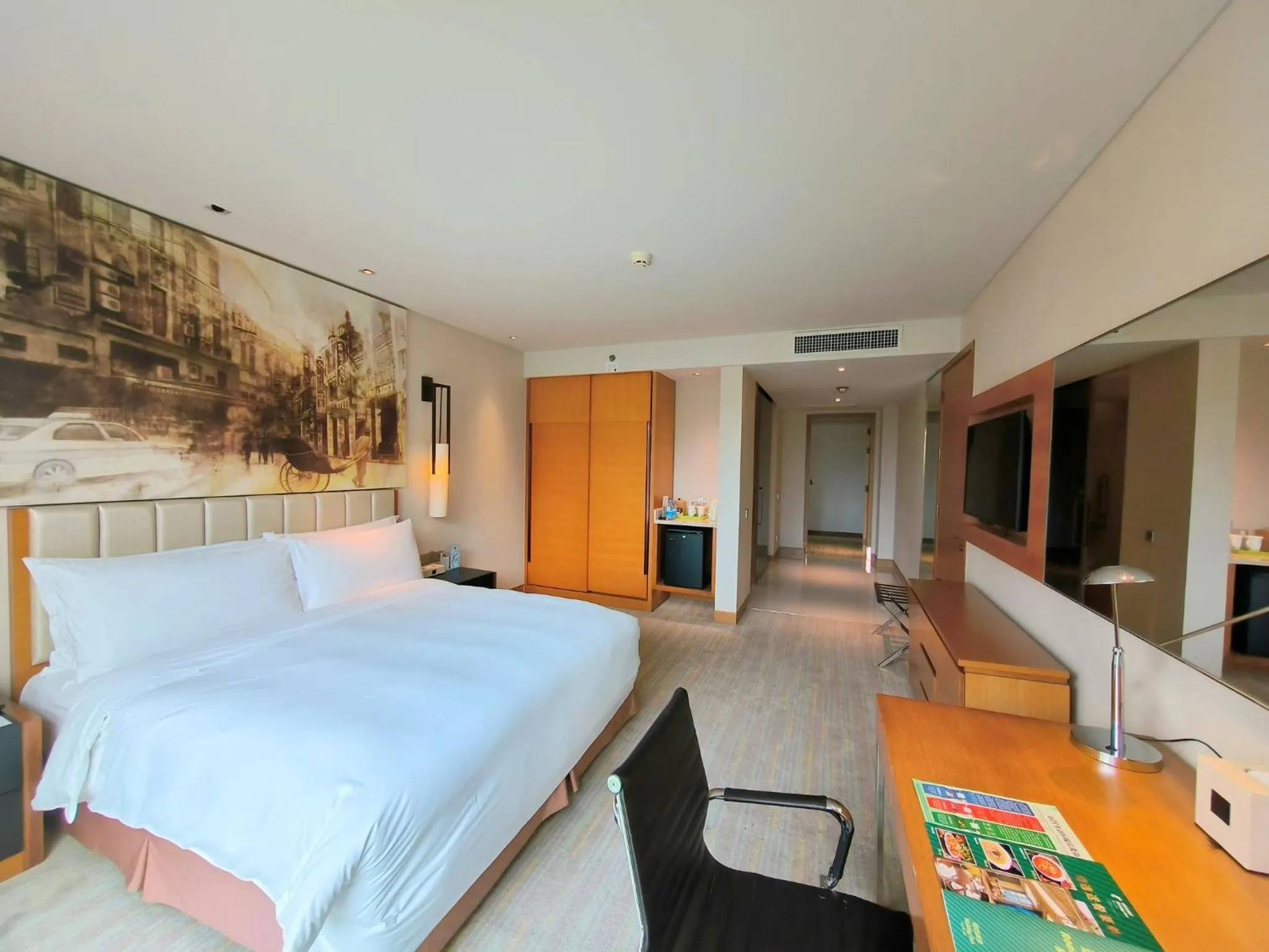 Photo of the whole room in Junluxe Hotel Guangzhou Science City-Free Shuttle Bus Service to Guangzhou Canton Fair