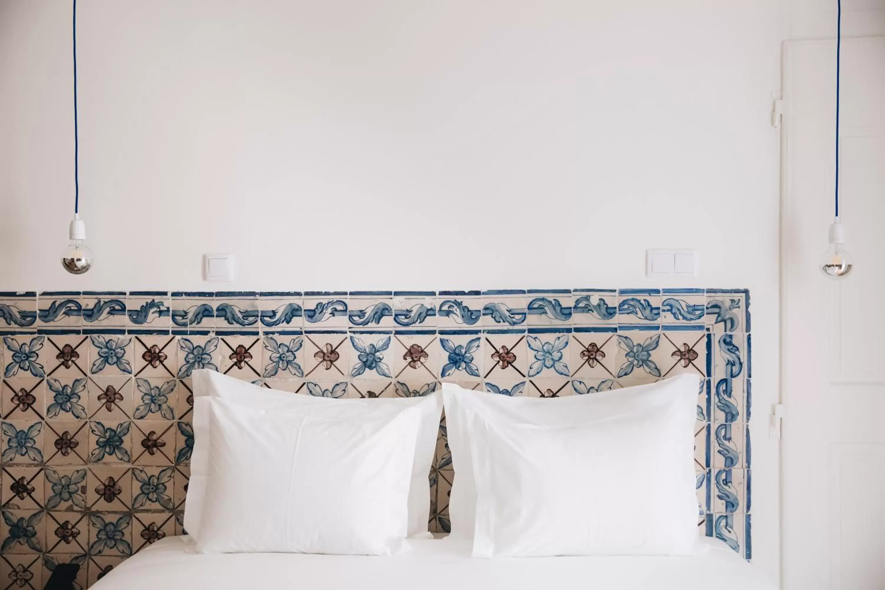 Decorative detail, Bed in Esqina Cosmopolitan Lodge