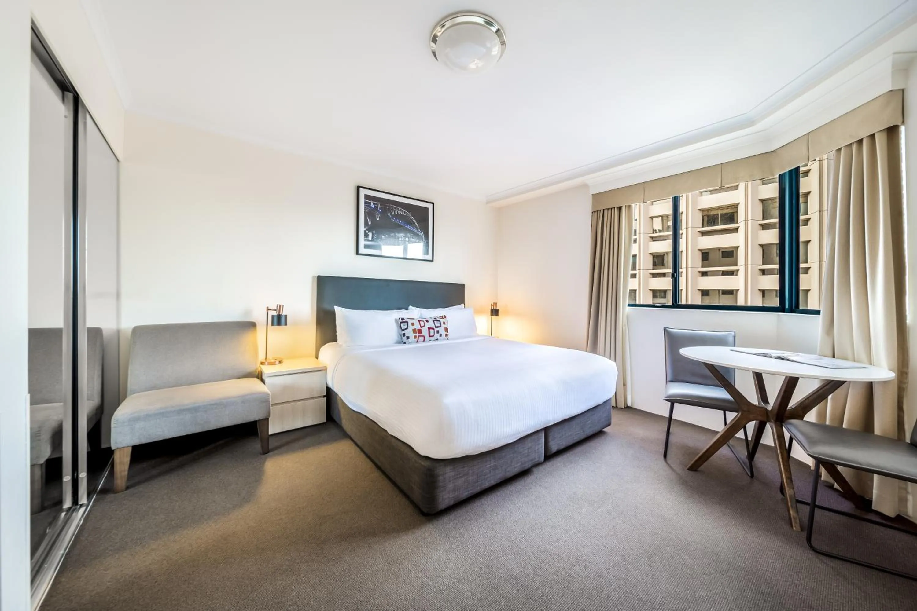 Bed in Oaks Sydney Castlereagh Suites