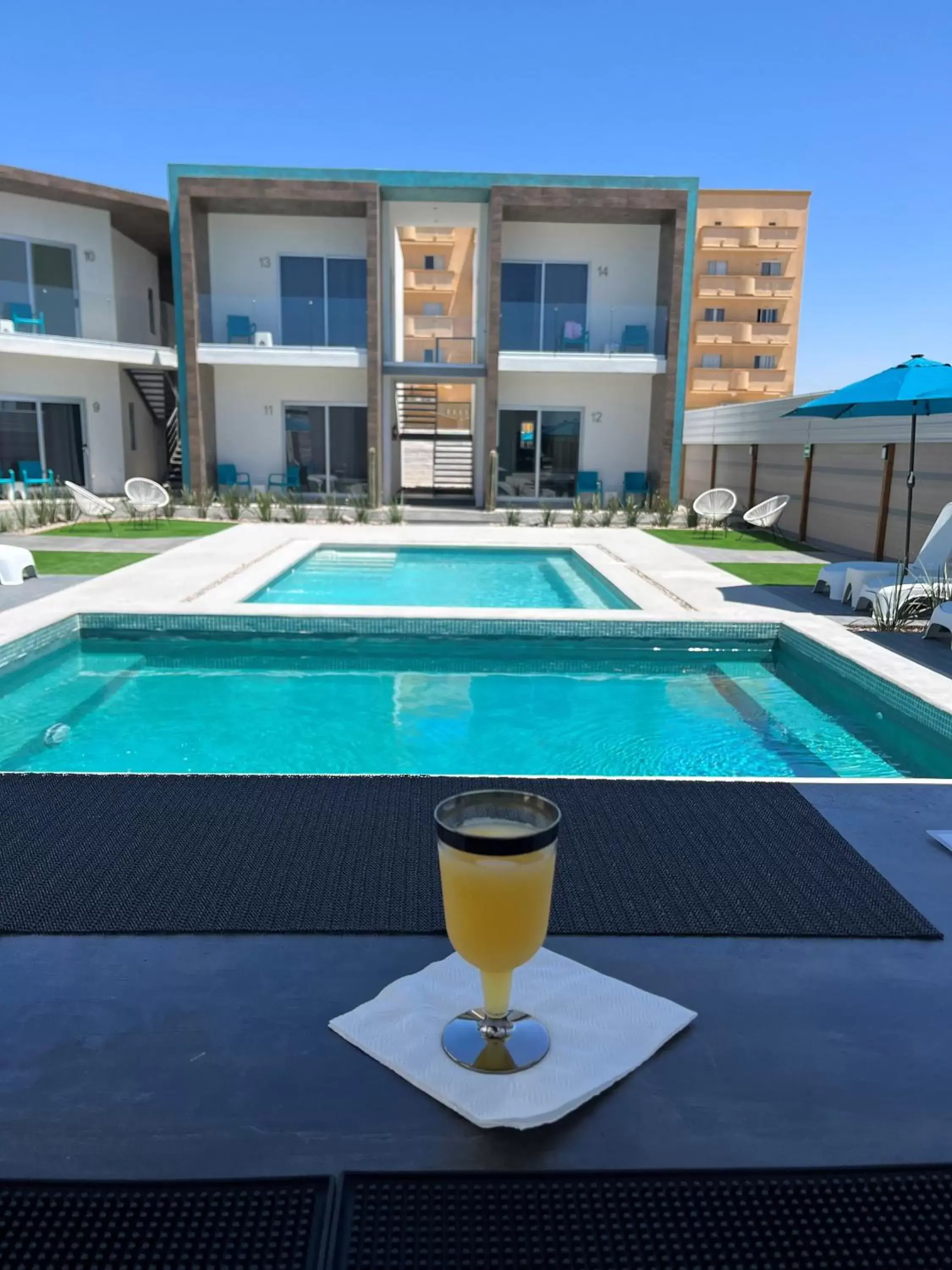 Lounge or bar, Swimming Pool in The Cove Boutique Hotel Adults Only