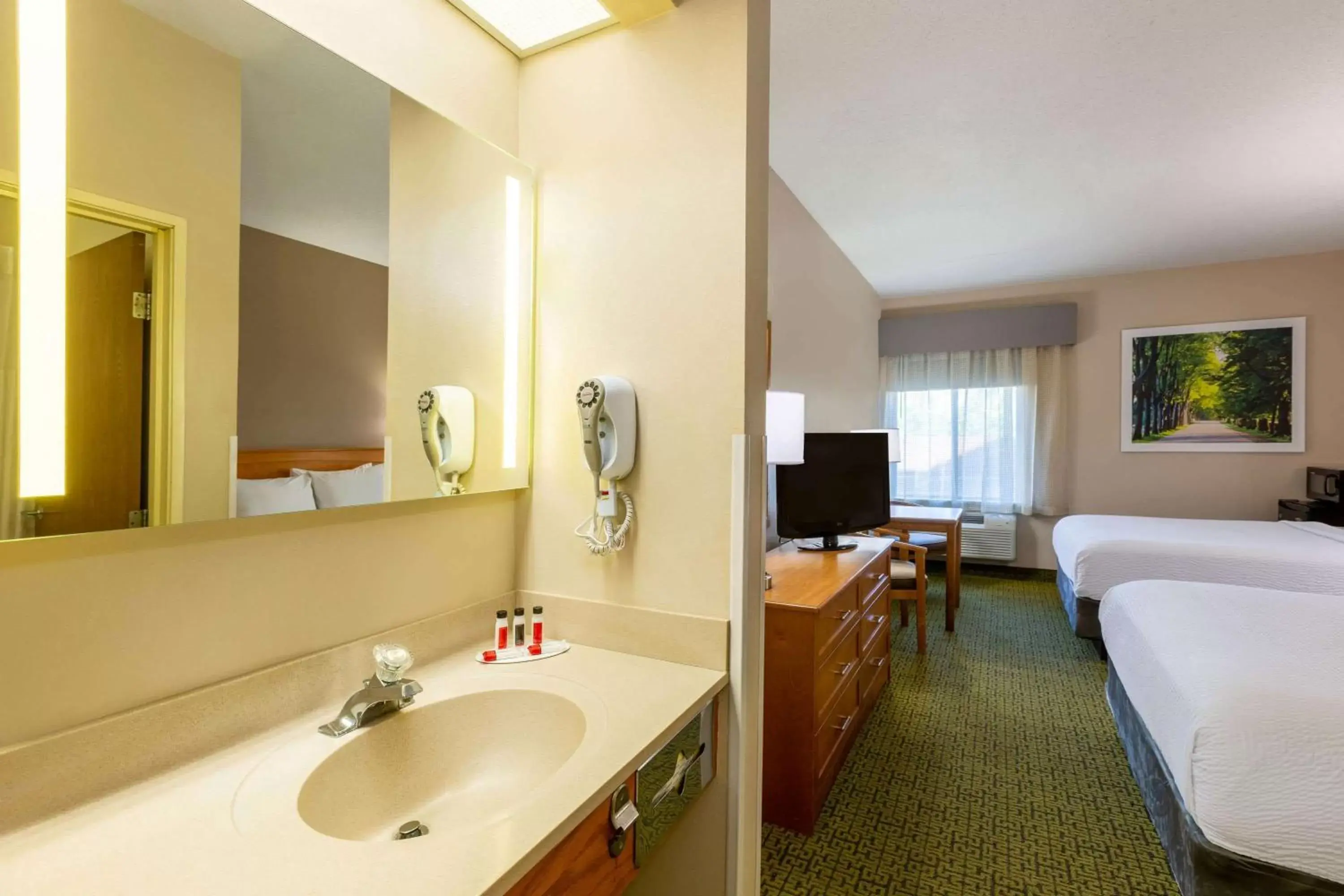 Bathroom in Days Inn & Suites by Wyndham Madison
