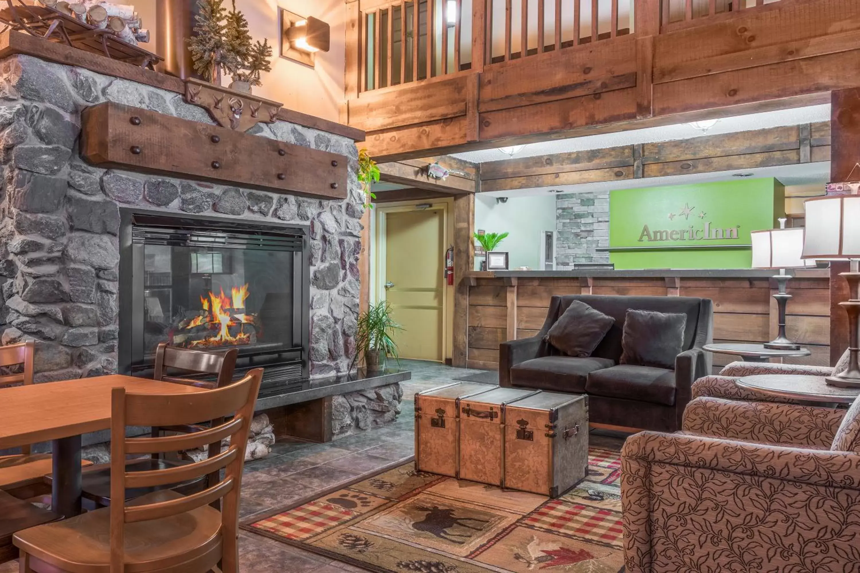 Living room, Seating Area in AmericInn by Wyndham Black River Falls I-94 on ATV Trail