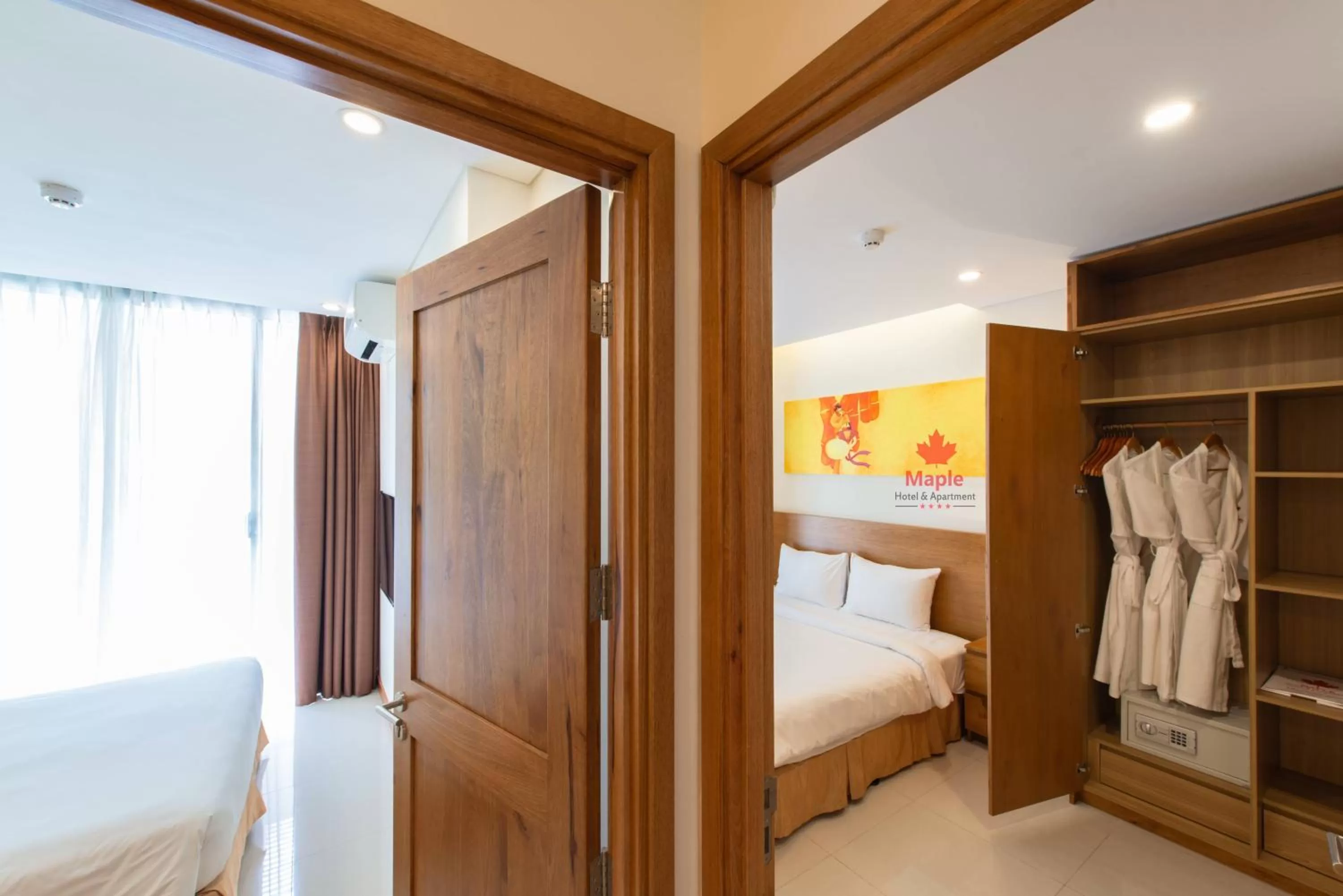 Photo of the whole room, Bed in Maple Hotel & Apartment