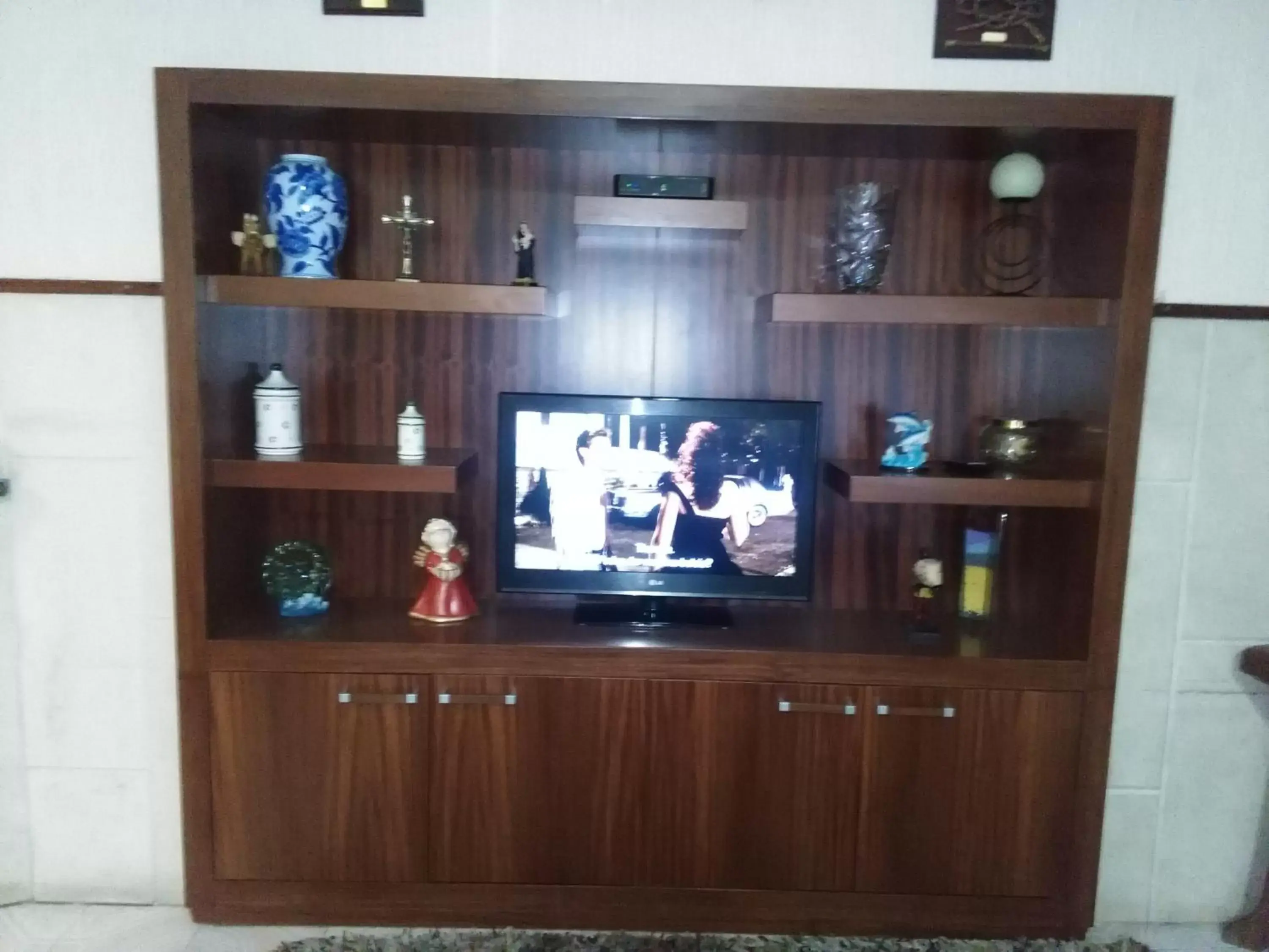 Communal lounge/ TV room, TV/Entertainment Center in Hotel Palmeira