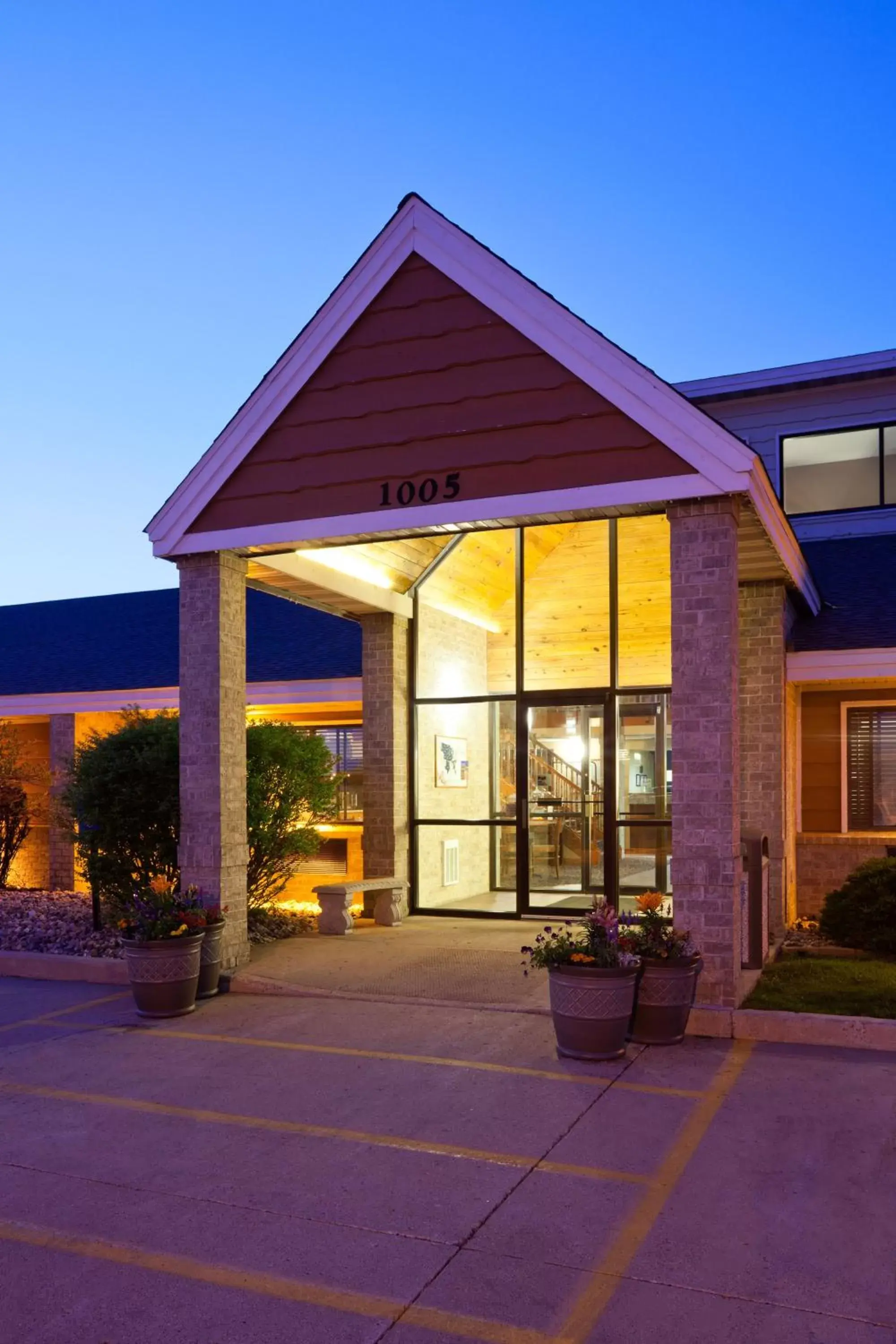 Facade/entrance, Patio/Outdoor Area in AmericInn by Wyndham Spencer