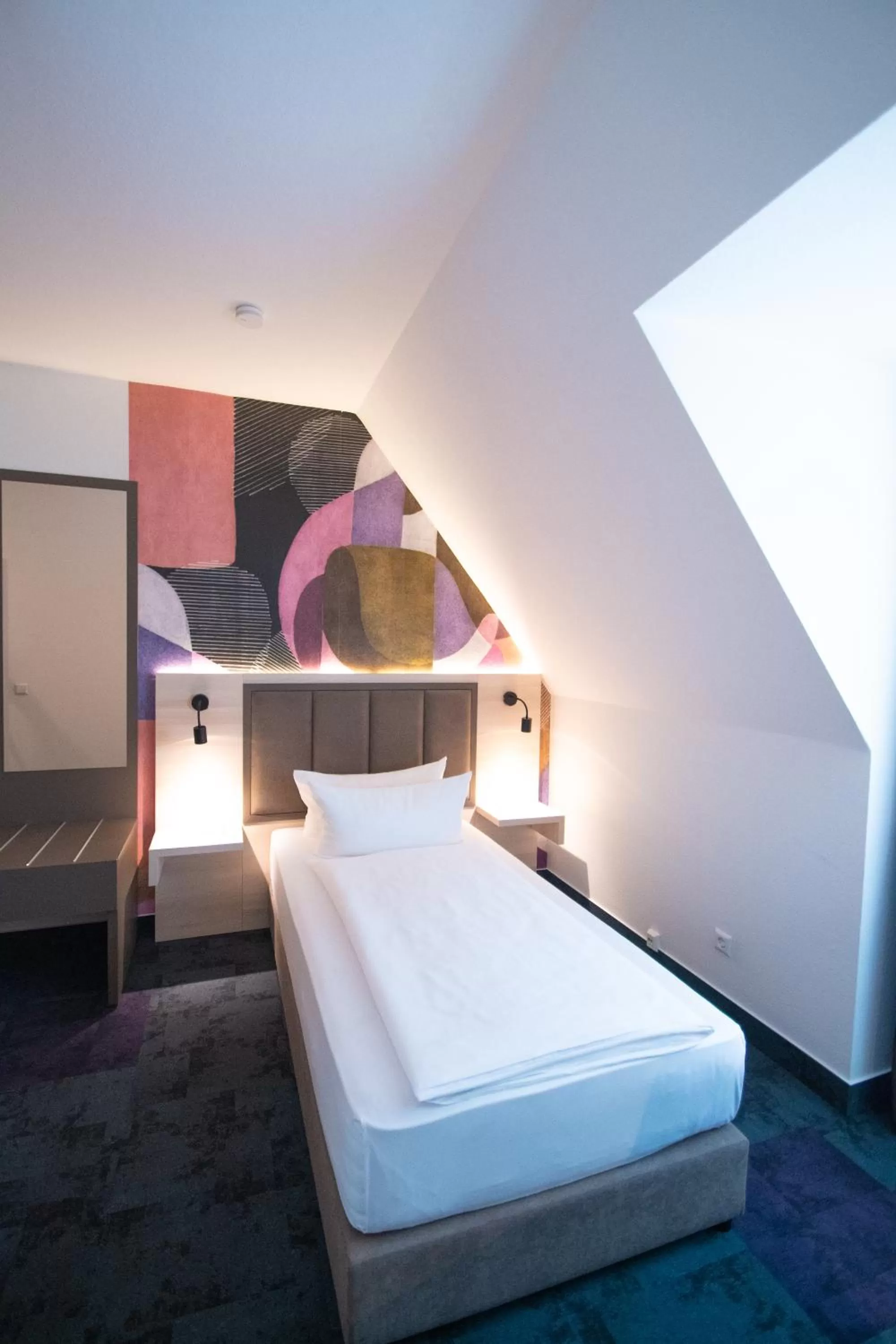 Photo of the whole room, Bed in Taste Hotel Kulmbach