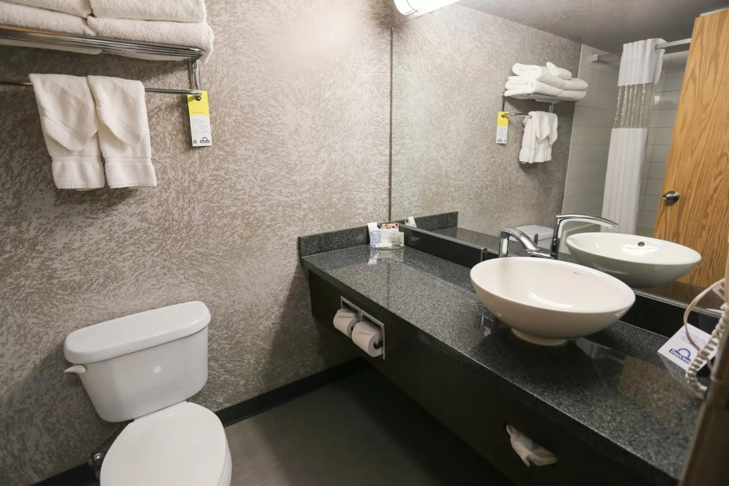 Bathroom in Days Inn by Wyndham Calgary Airport