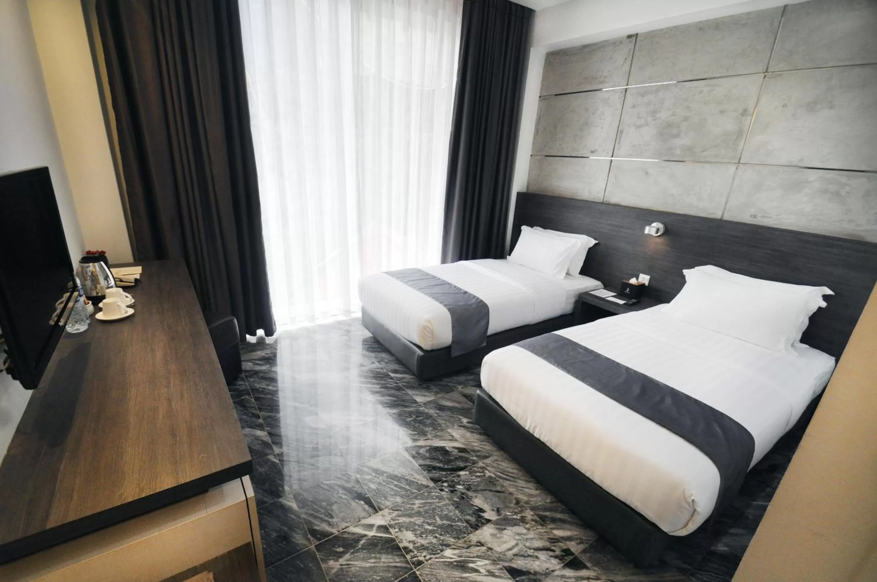 Bed in Dreamtel Jakarta