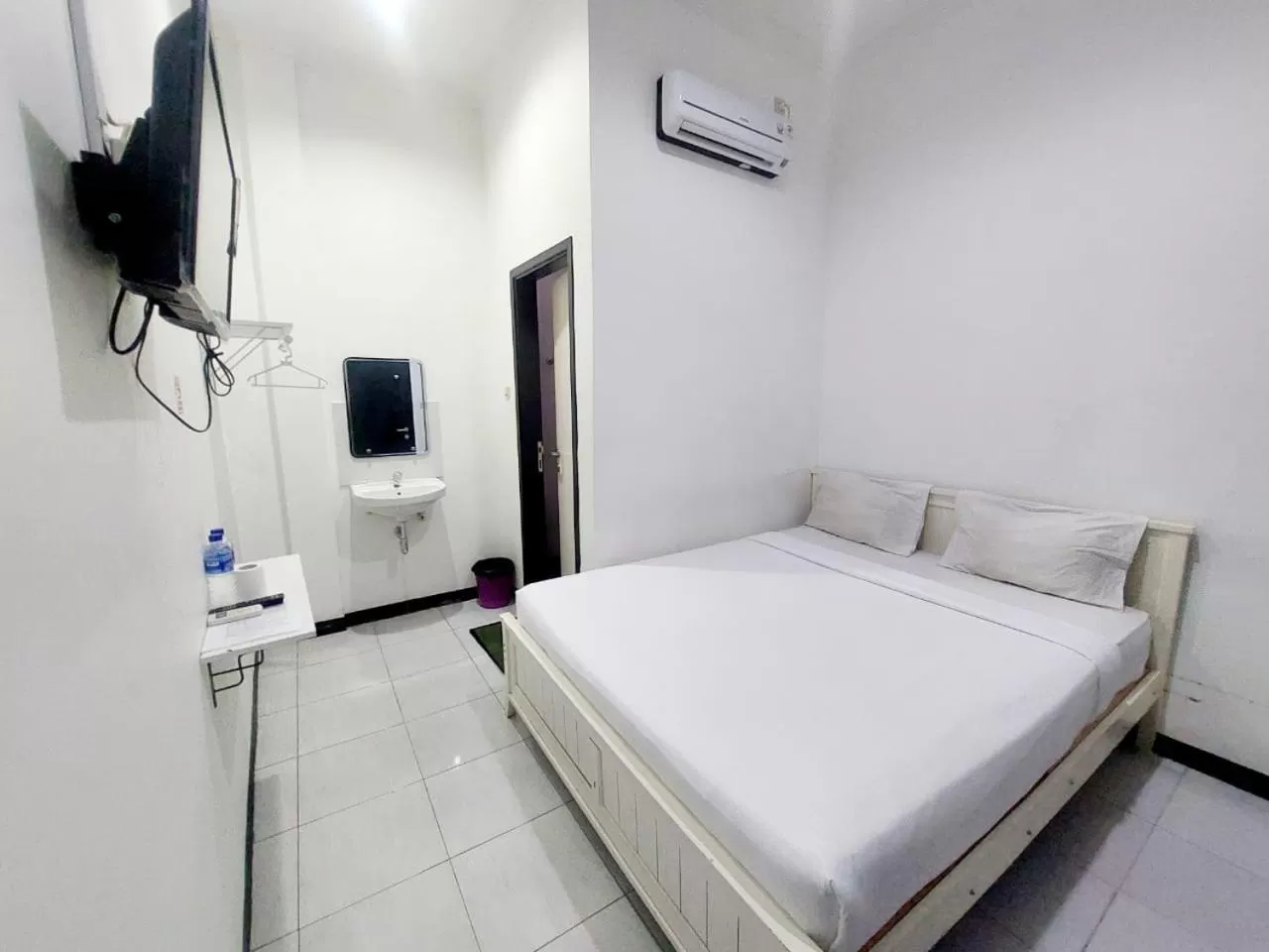 Bed in COZY STAY KUPANG