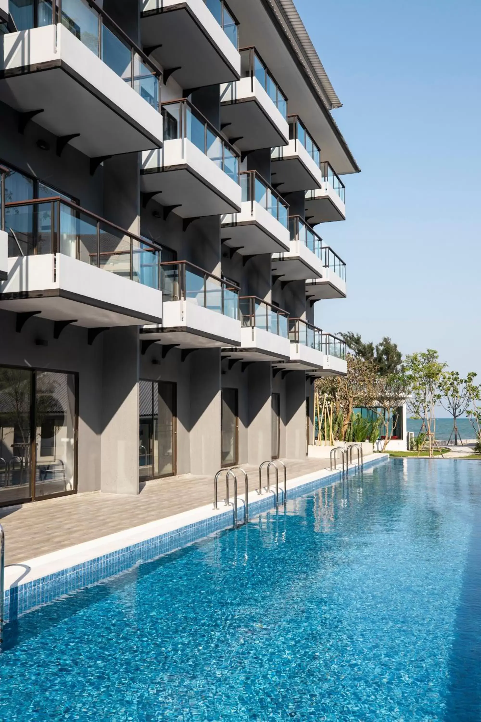 Swimming pool, Property Building in Centra by Centara Cha Am Beach Resort Hua Hin SHA Plus