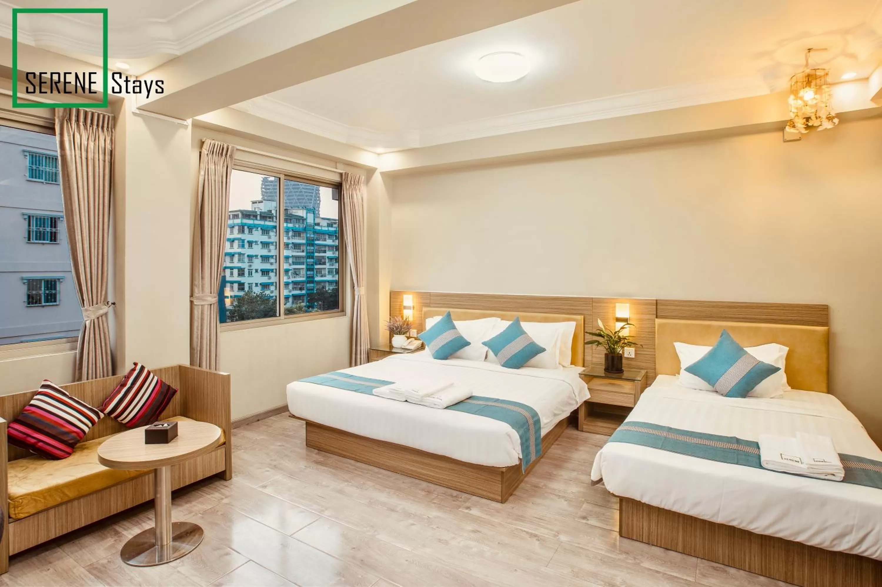 Photo of the whole room, Bed in SERENE Stays Hotel