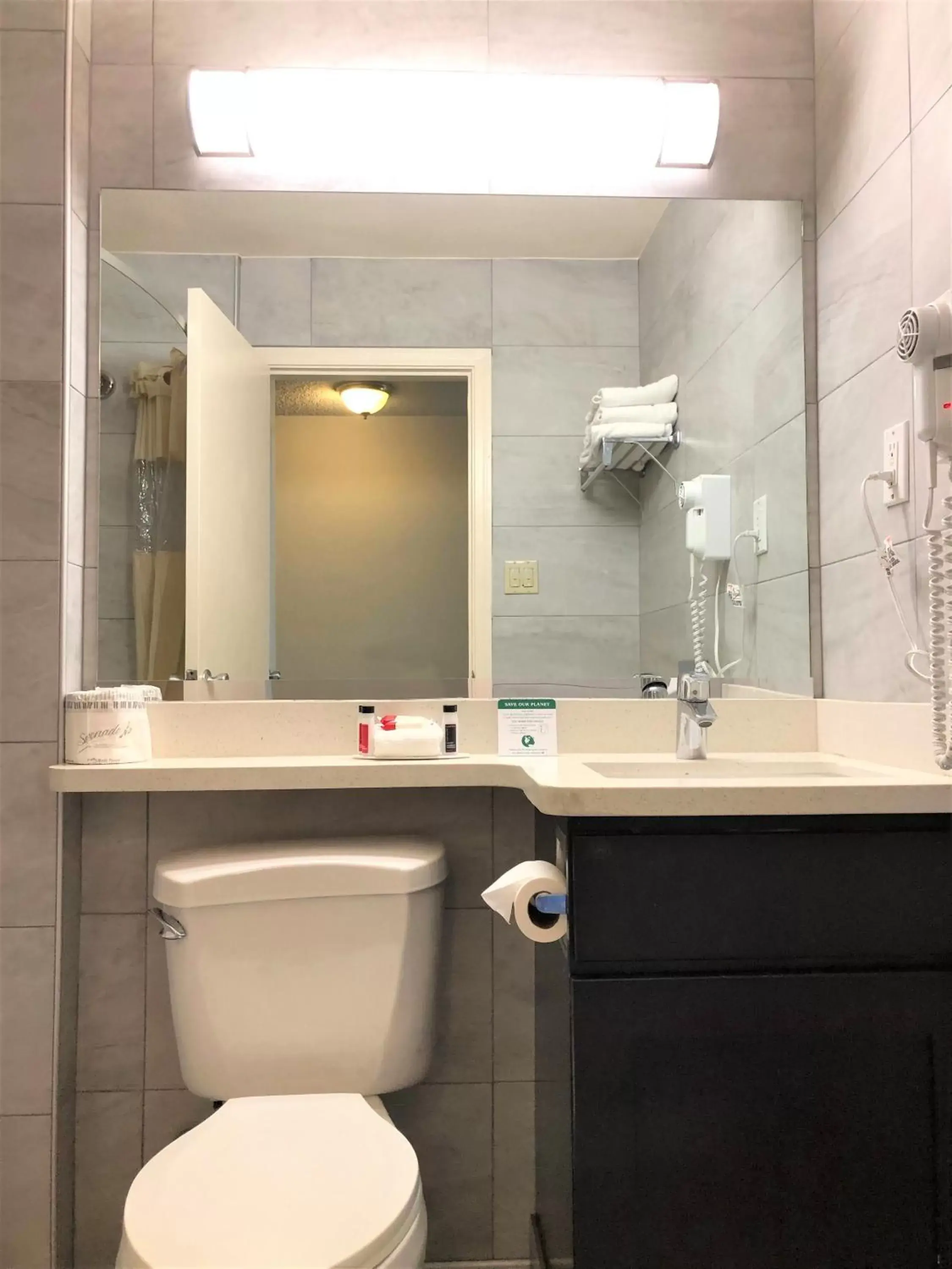 Toilet, Bathroom in Days Inn by Wyndham Novato/San Francisco