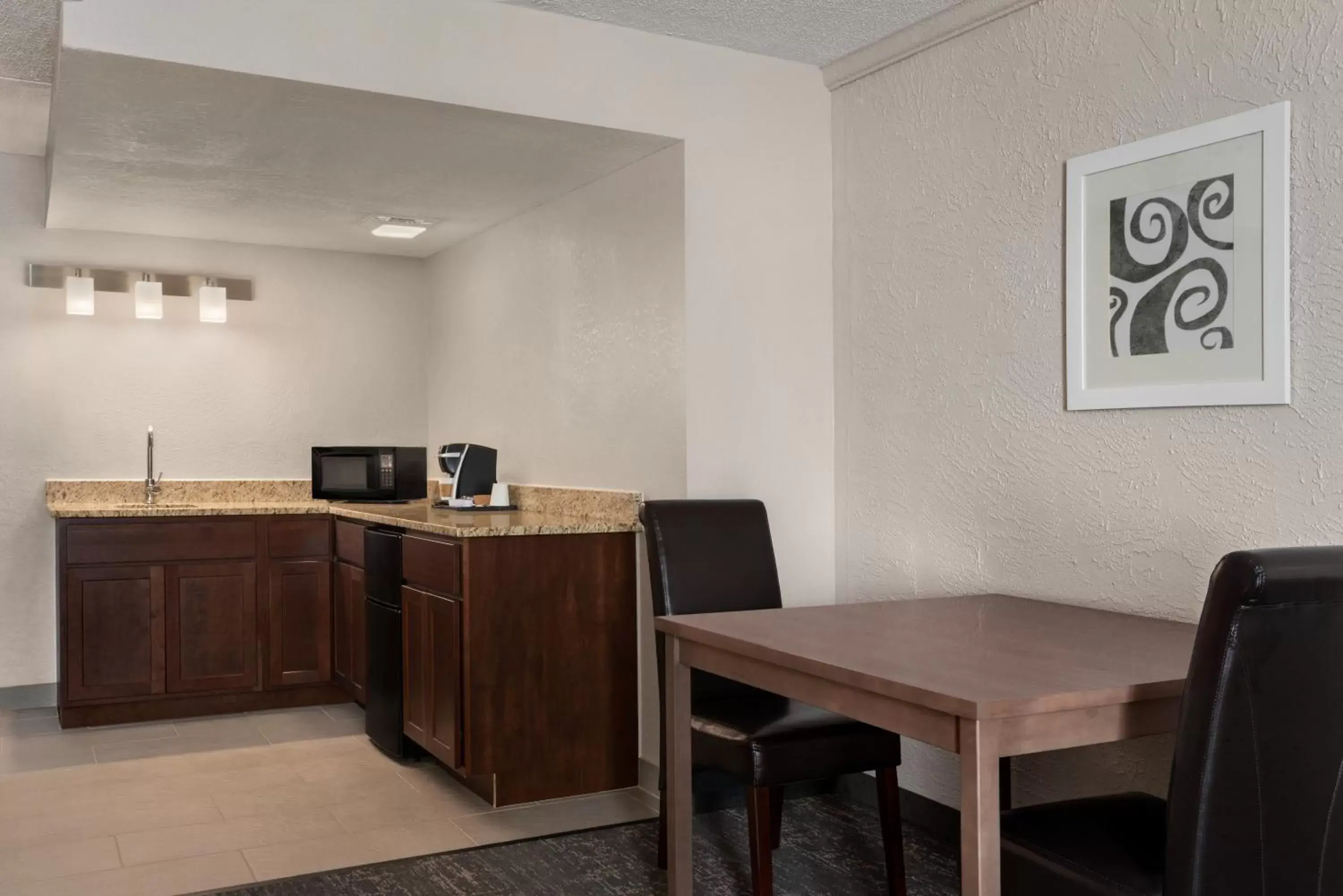 Dining area in Country Inn & Suites by Radisson, Mt. Pleasant-Racine West, WI