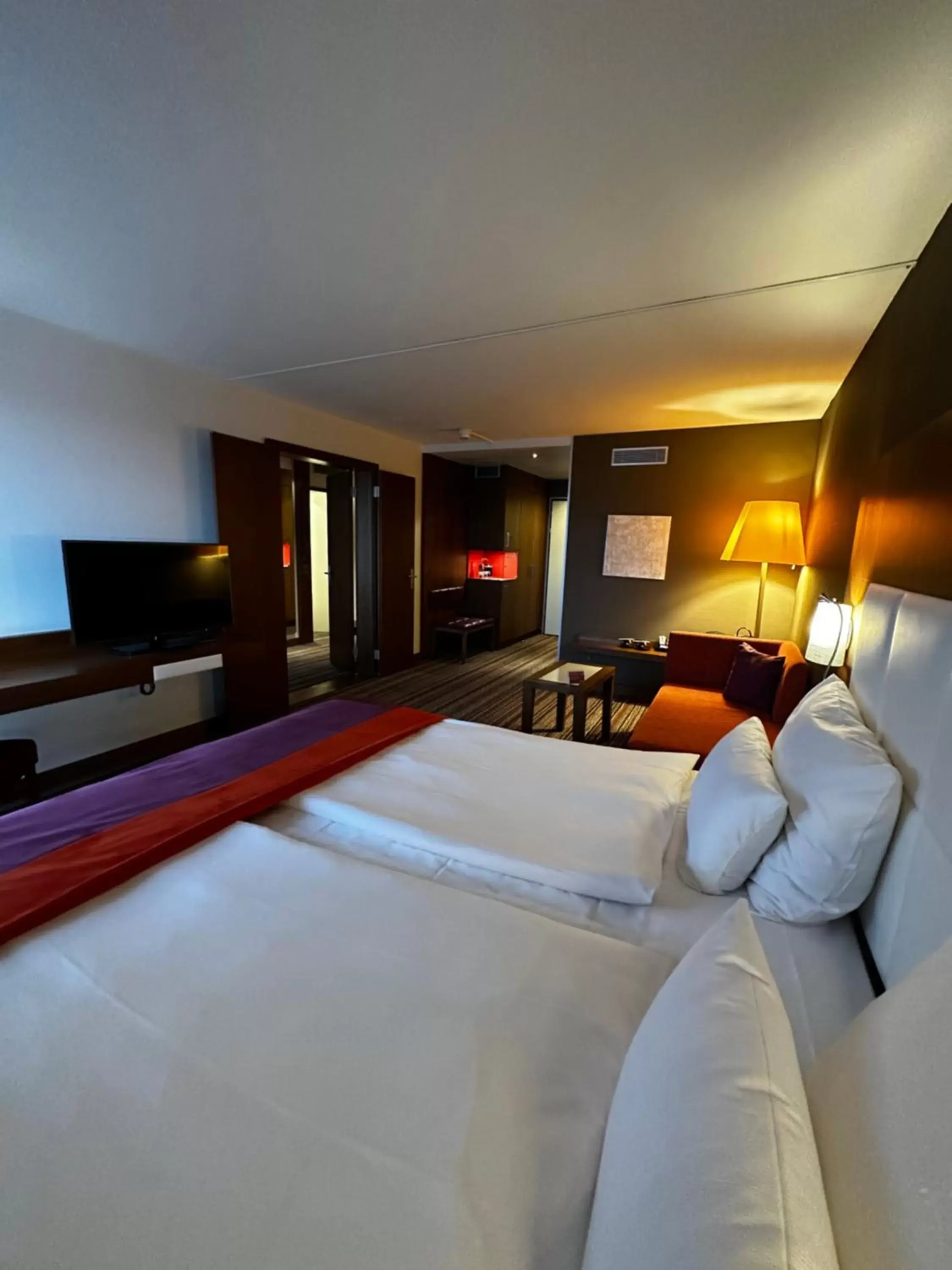 Photo of the whole room, Bed in Mövenpick Hotel Zurich Airport