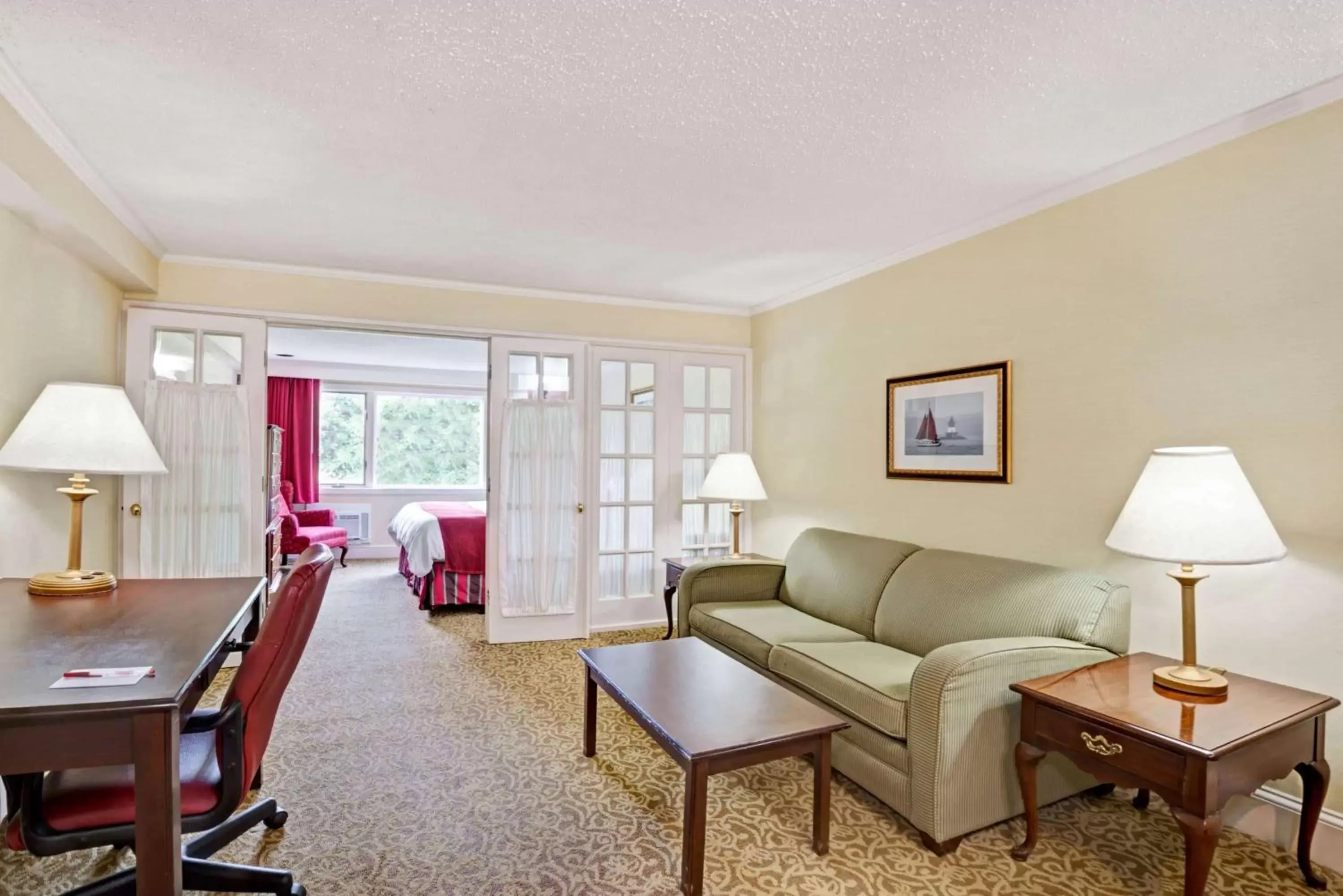 Photo of the whole room, Seating Area in Ramada by Wyndham Seekonk Providence Area
