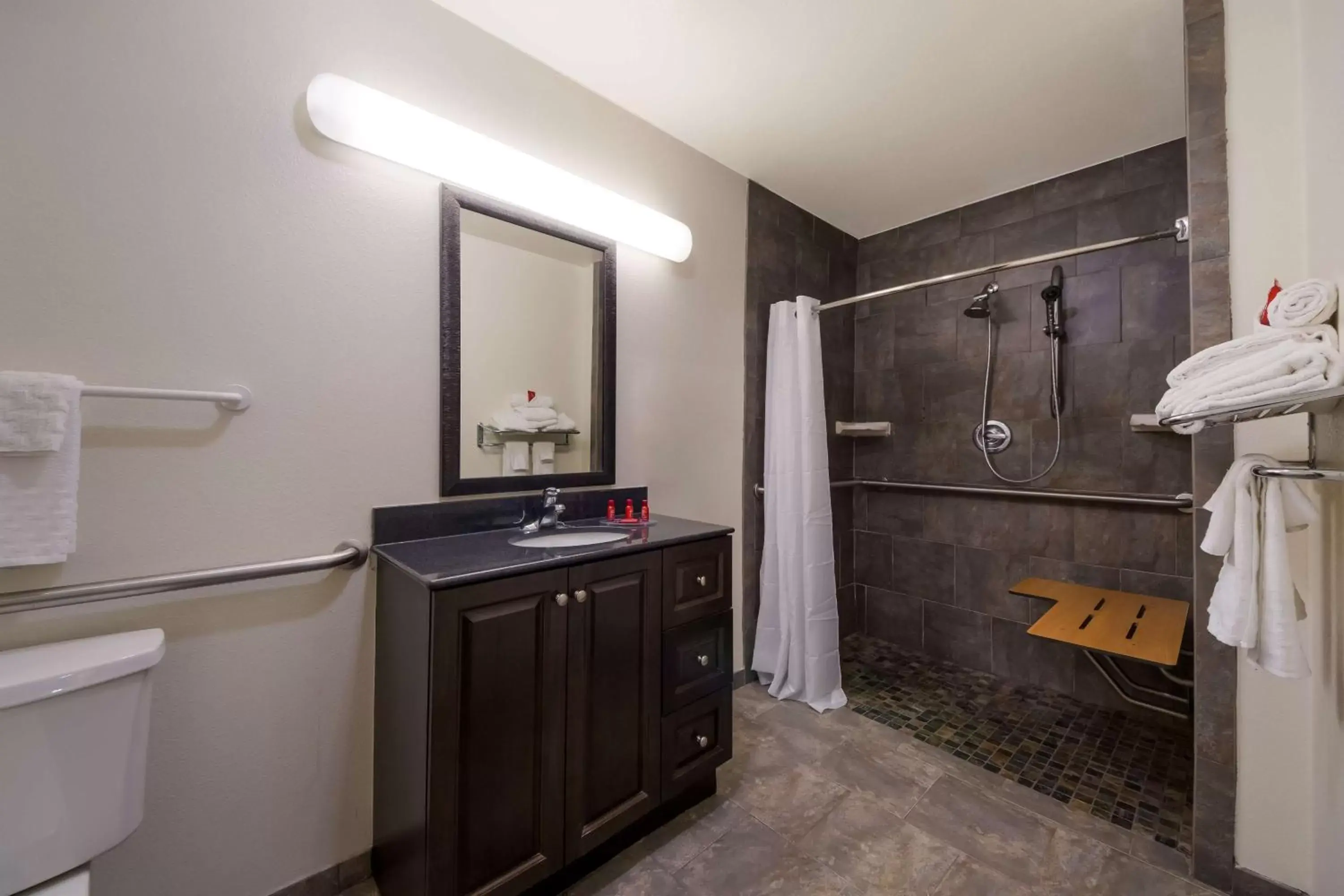 Bathroom in SureStay Hotel by Best Western Falfurrias