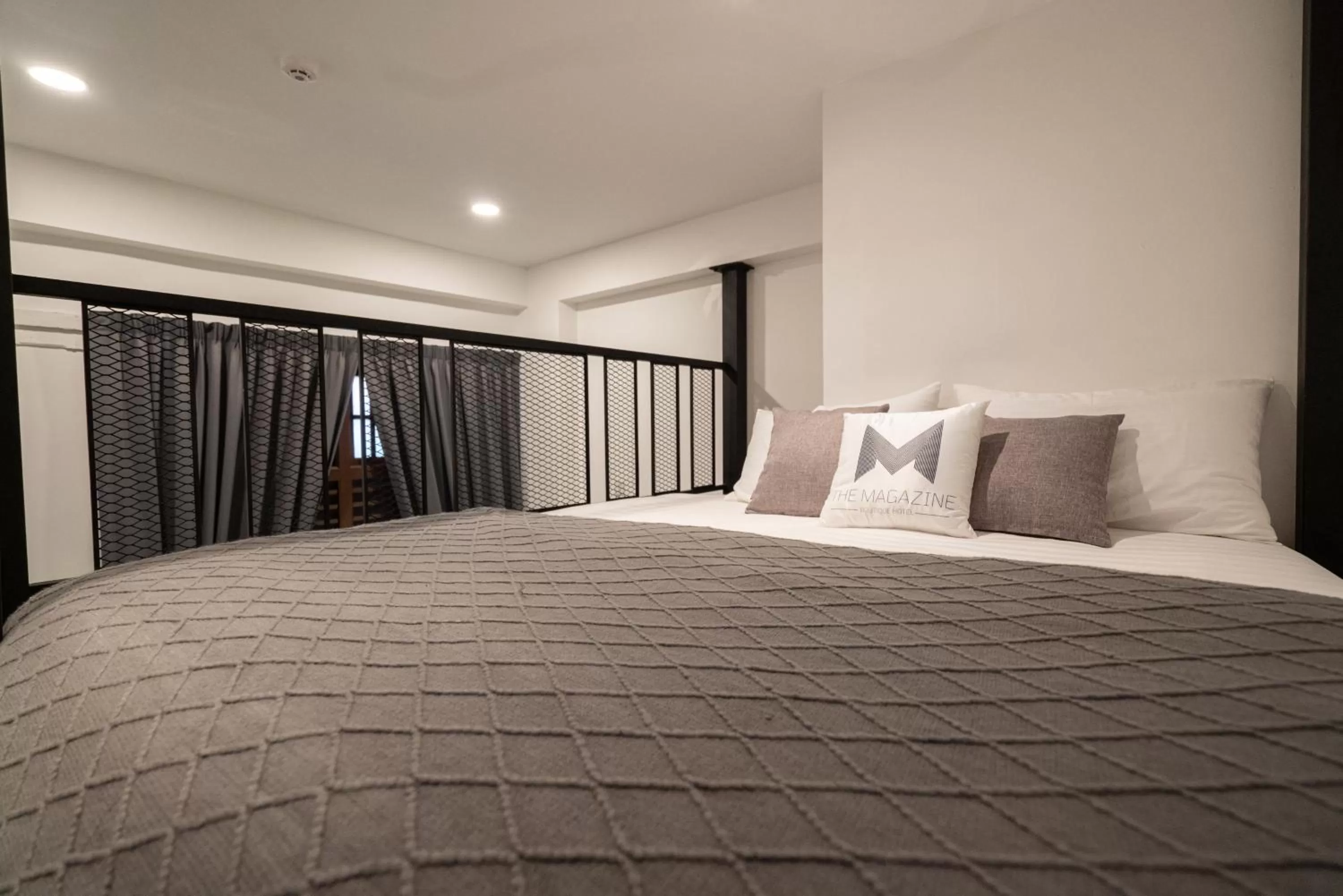 Bed in The Magazine Boutique Hotel